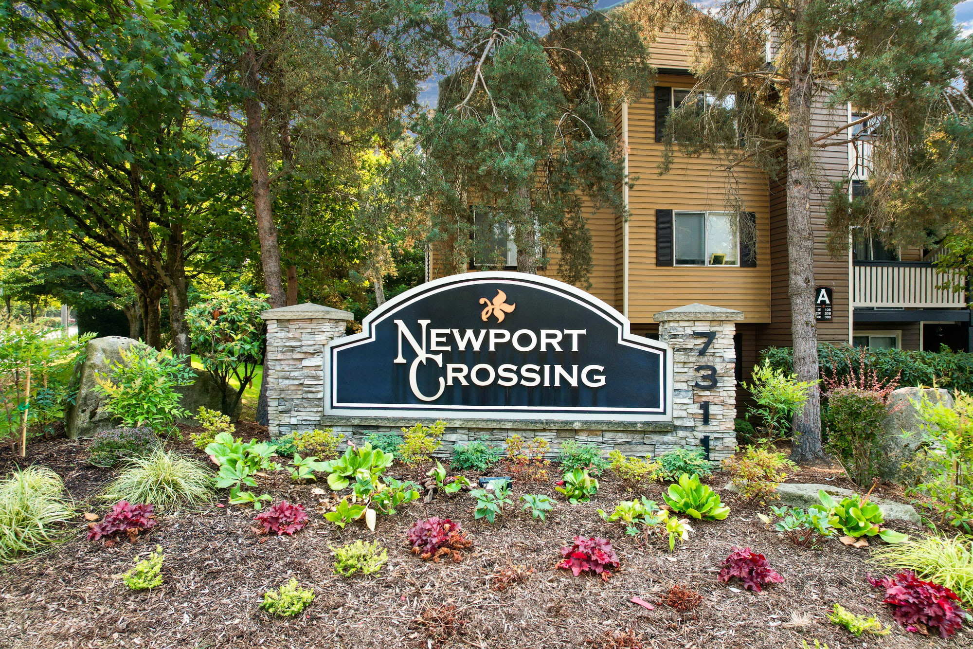 Monument sign at Newport Crossing Apartments in Newcastle, Washington