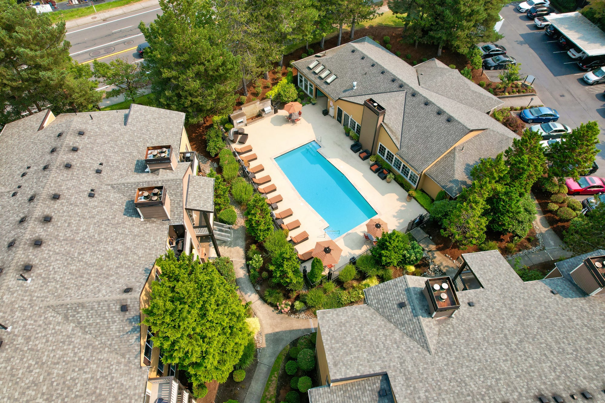 The deck along the pool - aerial view at Newport Crossing Apartments in Newcastle, Washington