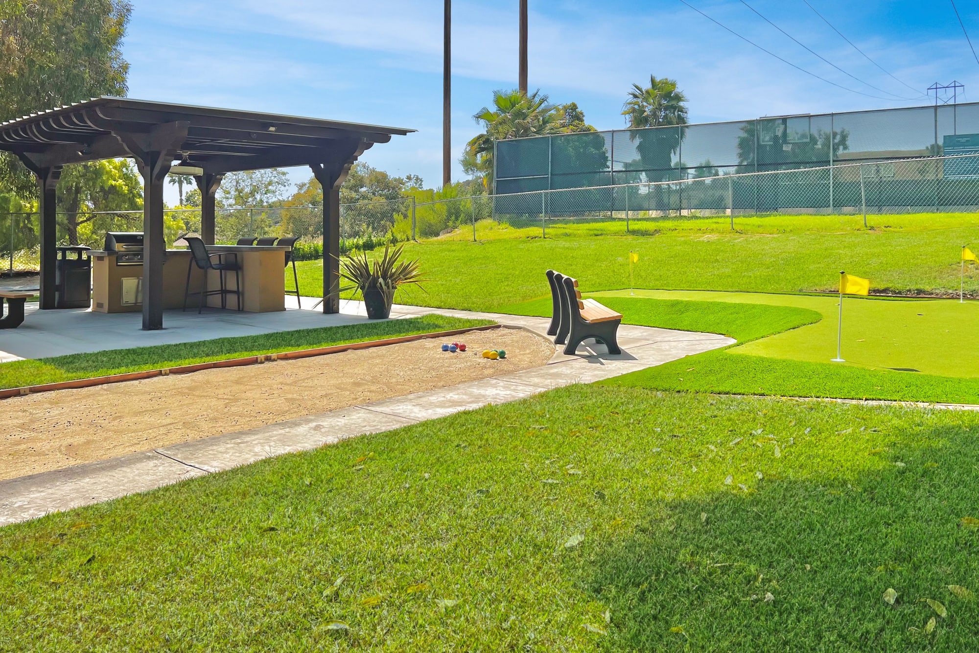 Corn hole, covered grills, putting green and a picnic area at Shadow Ridge Apartments in Oceanside, California