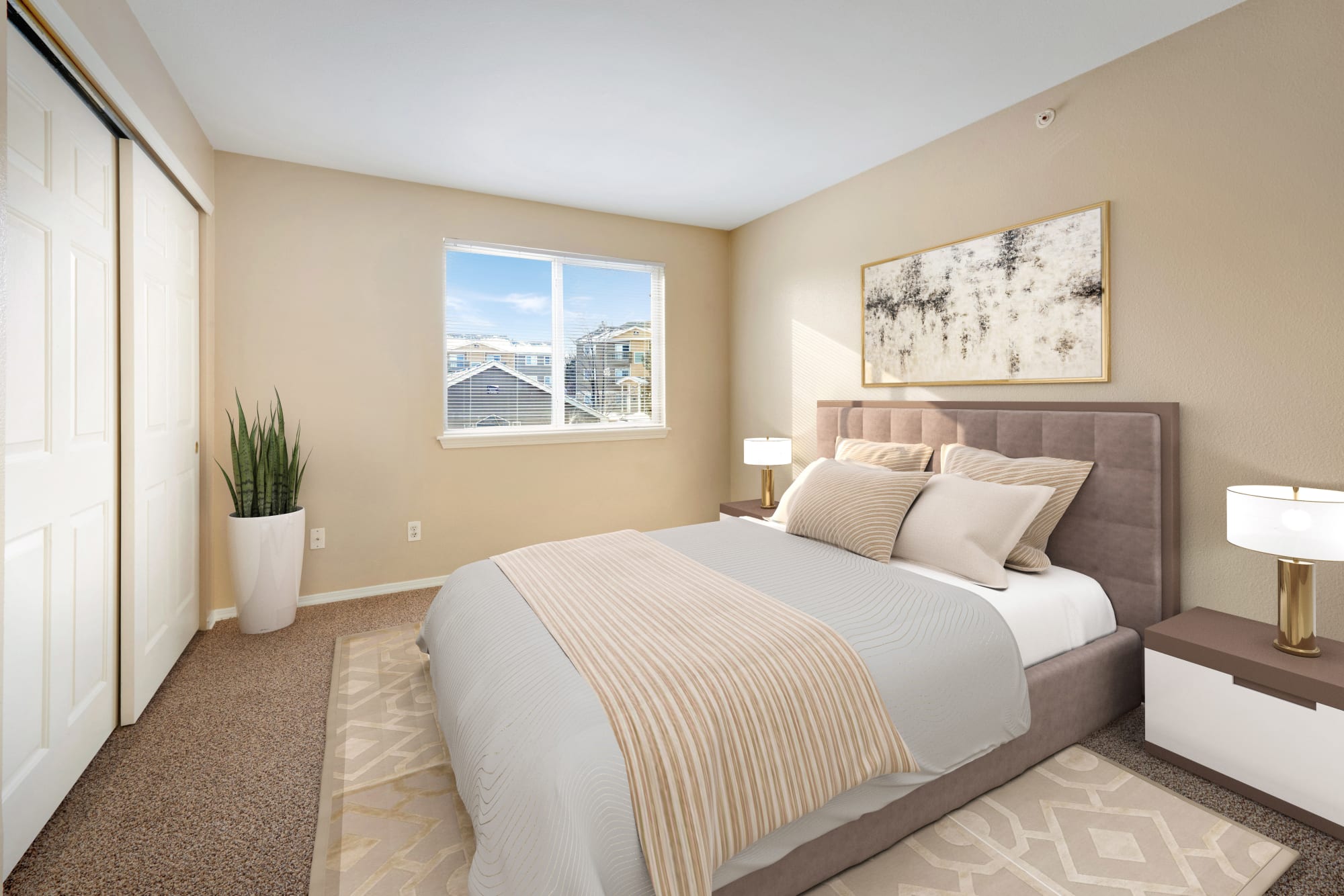 Master bedroom at Crossroads at City Center Apartments in Aurora, Colorado