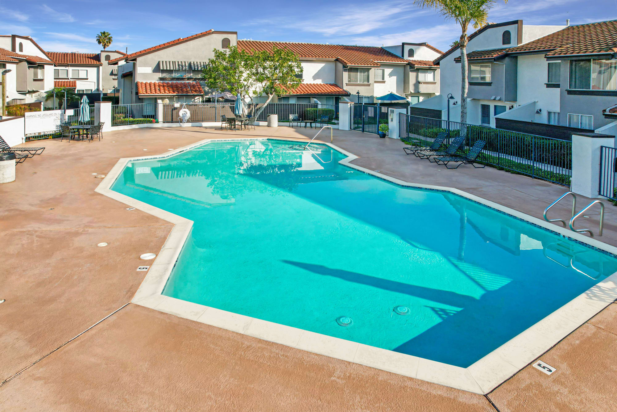 The sparkling swimming pool at Portofino Townhomes in Wilmington, California