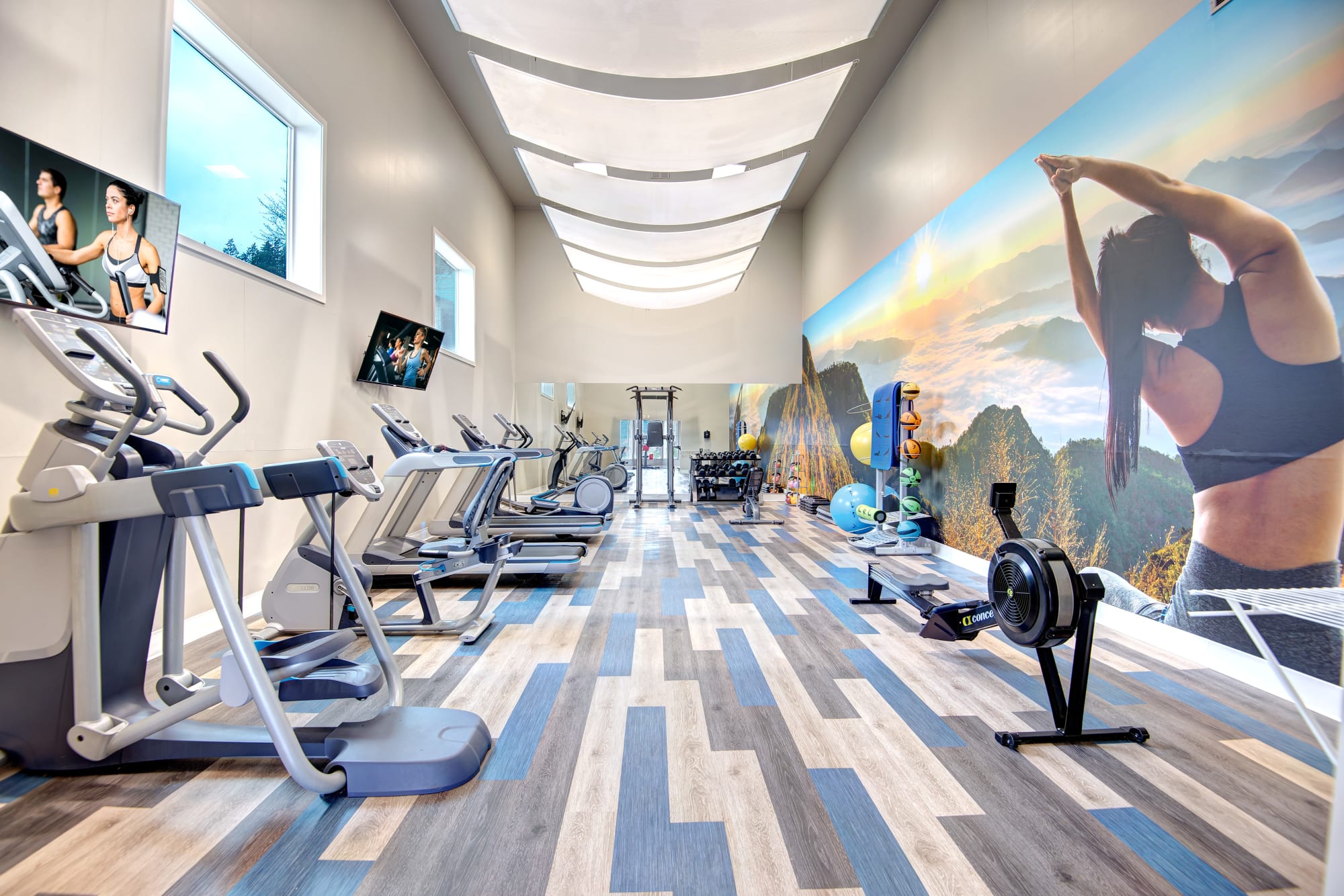 The fully equipped gym at Wellington Apartment Homes in Silverdale, Washington