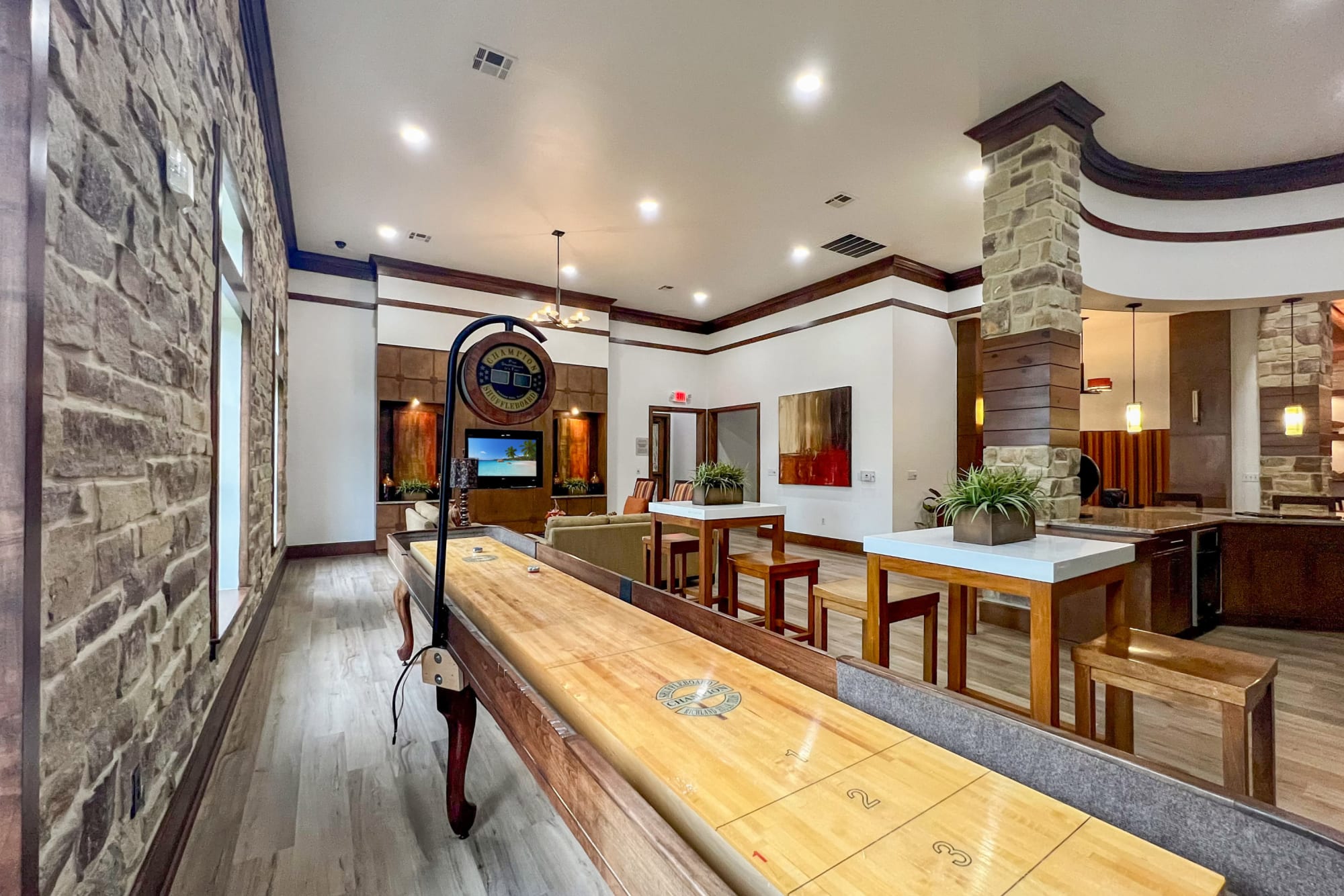 Shuffleboard in Community Room Lounge at Broadstone Grand Avenue in Pflugerville, Texas