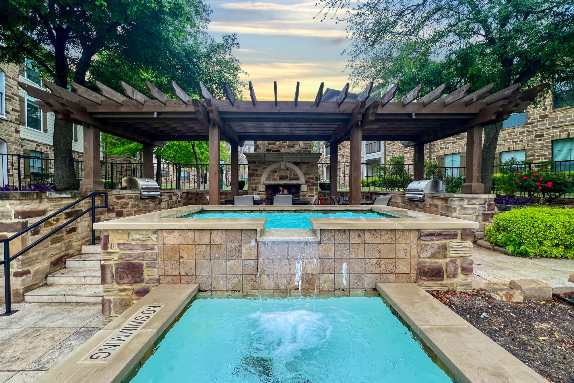 Poolside BBQ and Fireplace at Broadstone Grand Avenue in Pflugerville, Texas