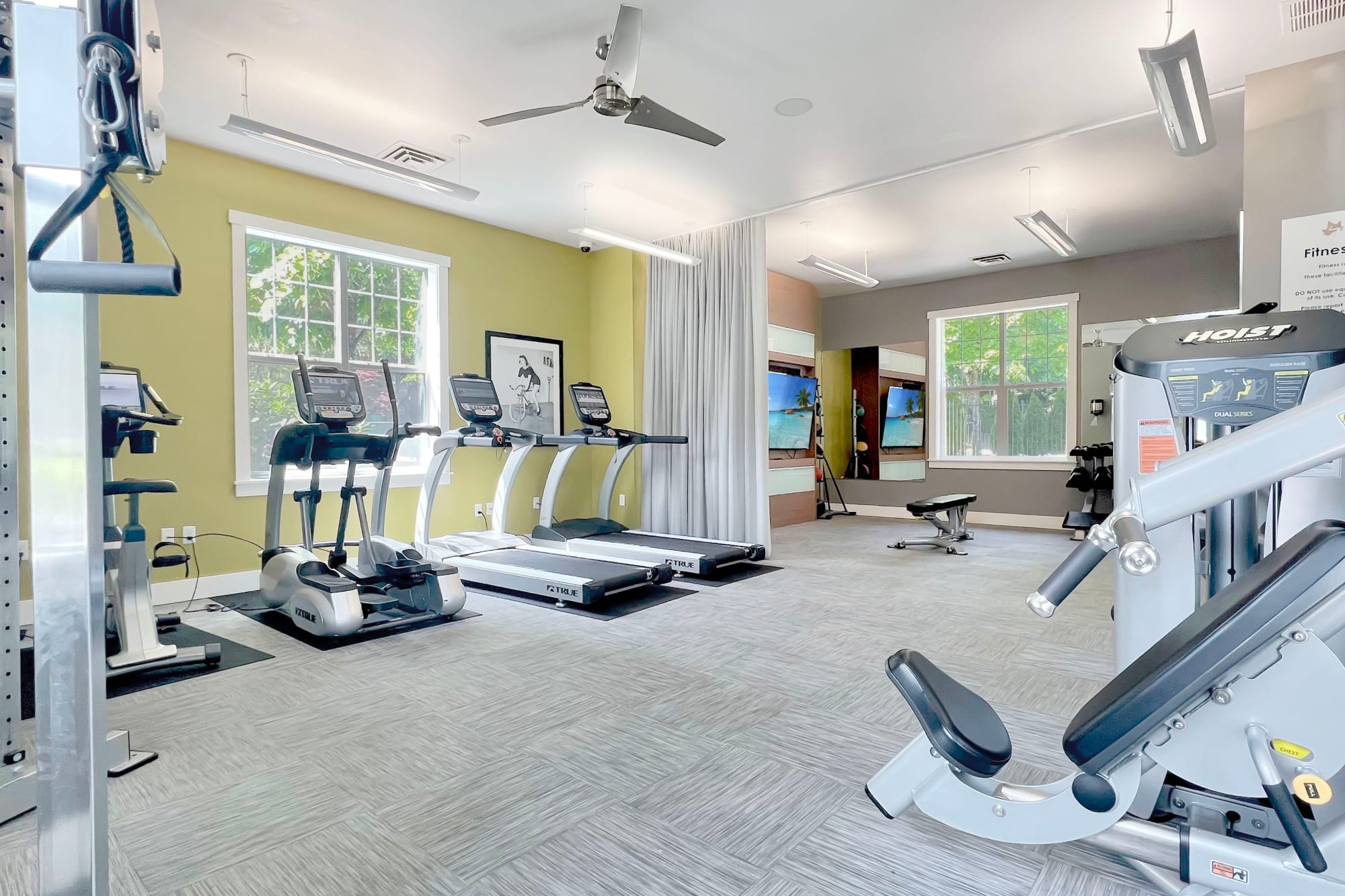 A fitness center with treadmills at Brookside Village in Auburn, Washington