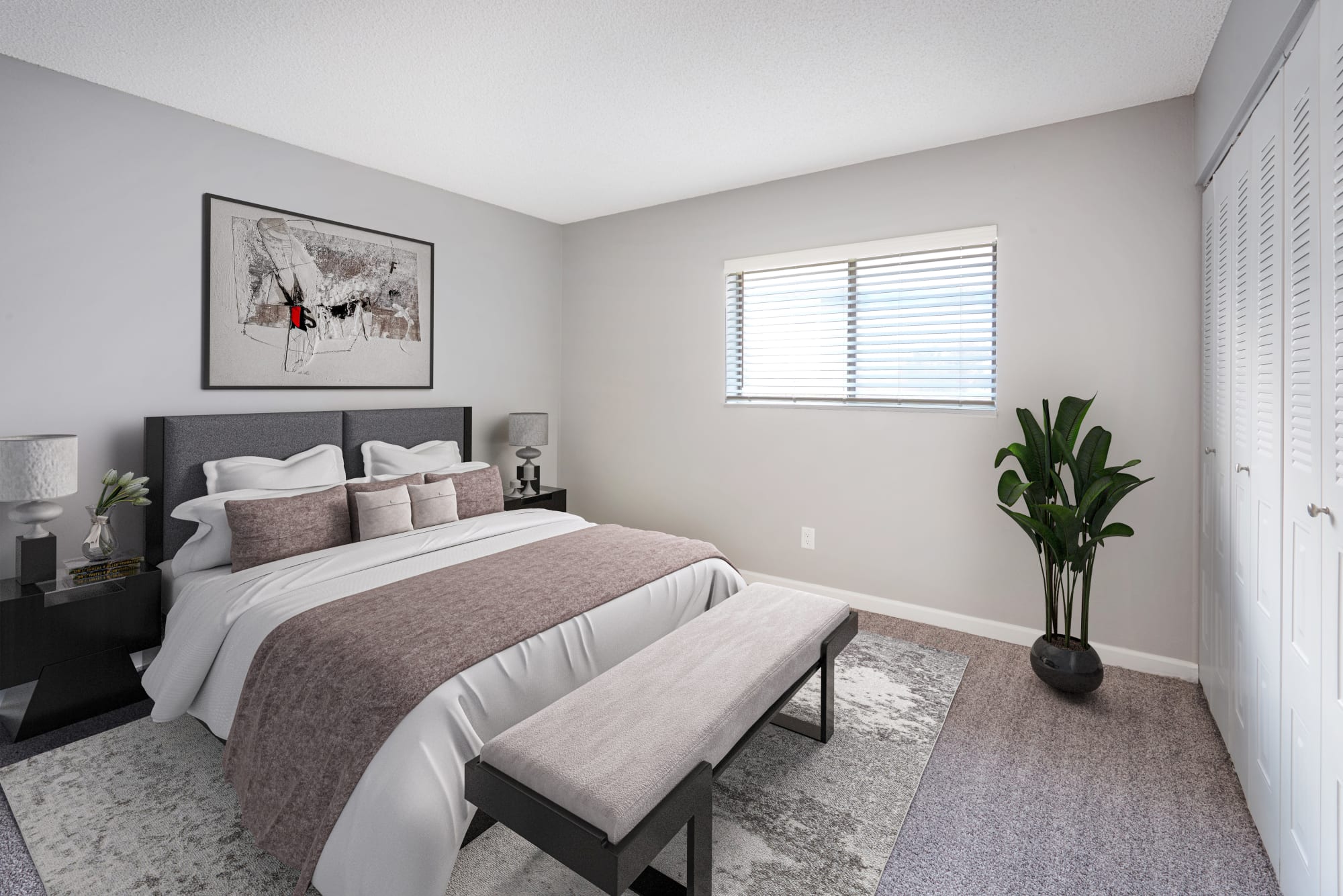 Spacious master bedroom at Alton Green Apartments in Denver, Colorado