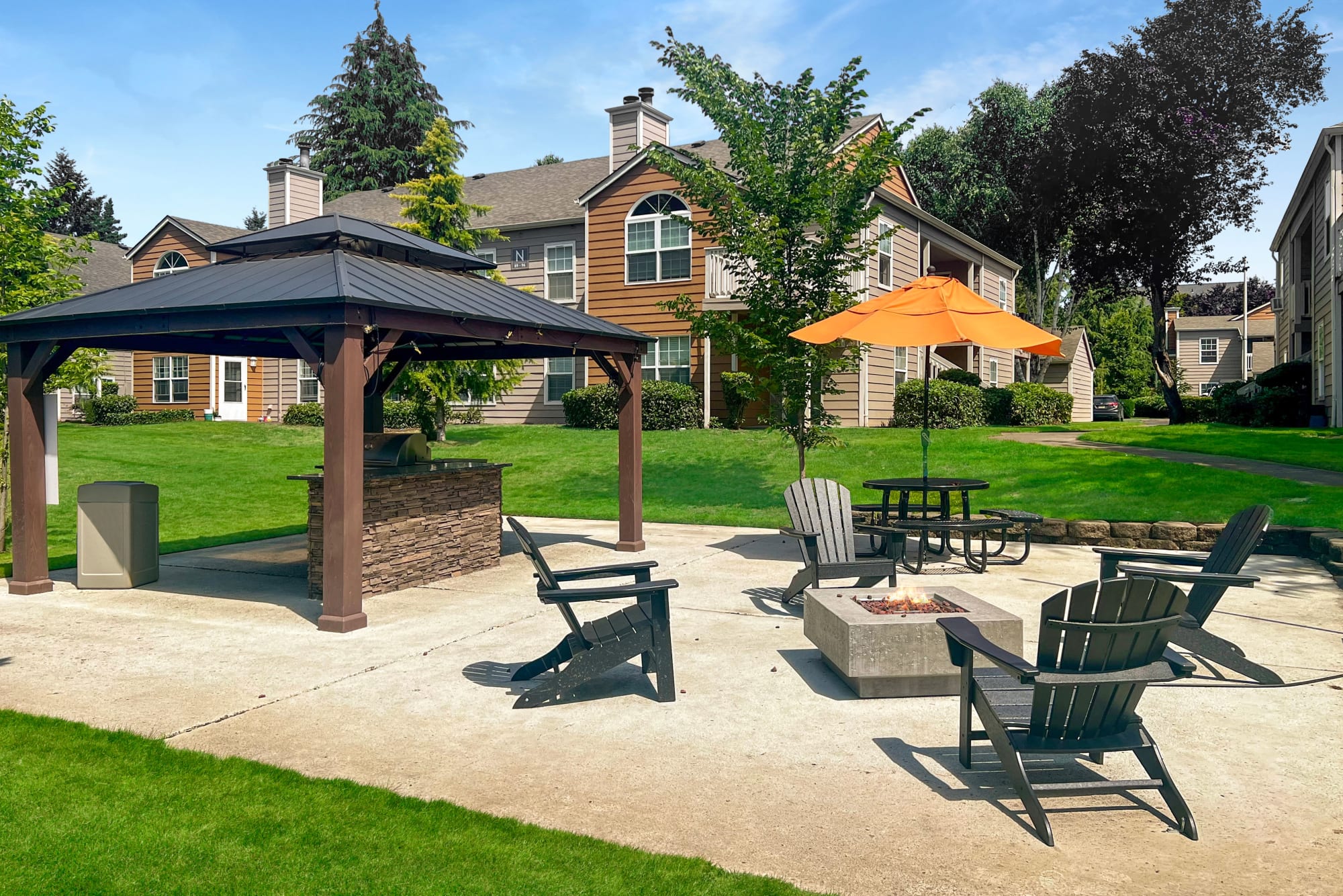 BBQ and Fire Pit at Carriage Park Apartments in Vancouver, Washington