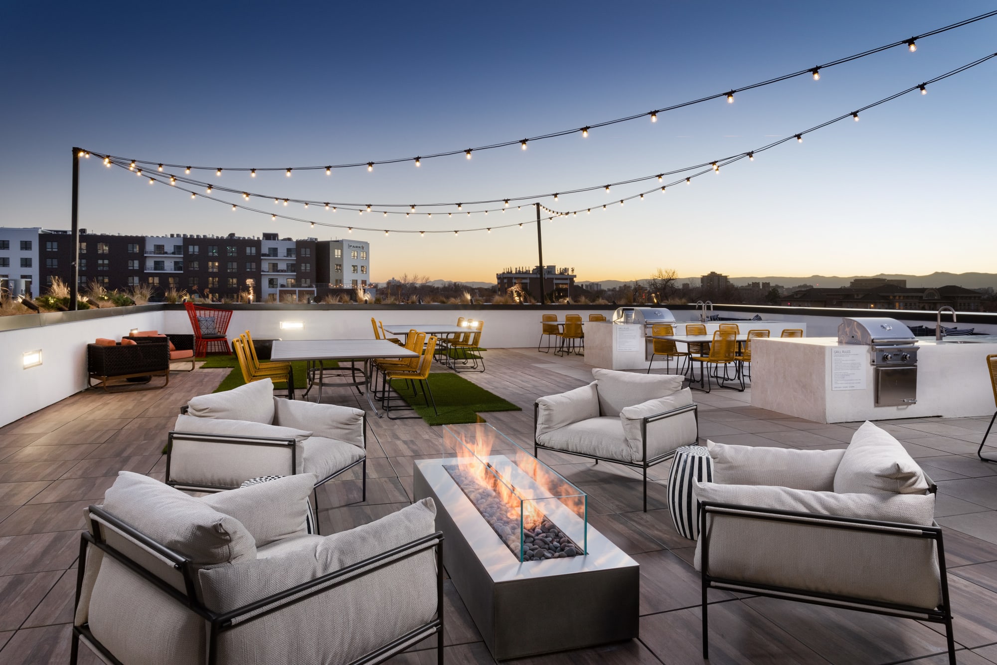 Rooftop common area with fire pit at The Kendrick in Denver, Colorado
