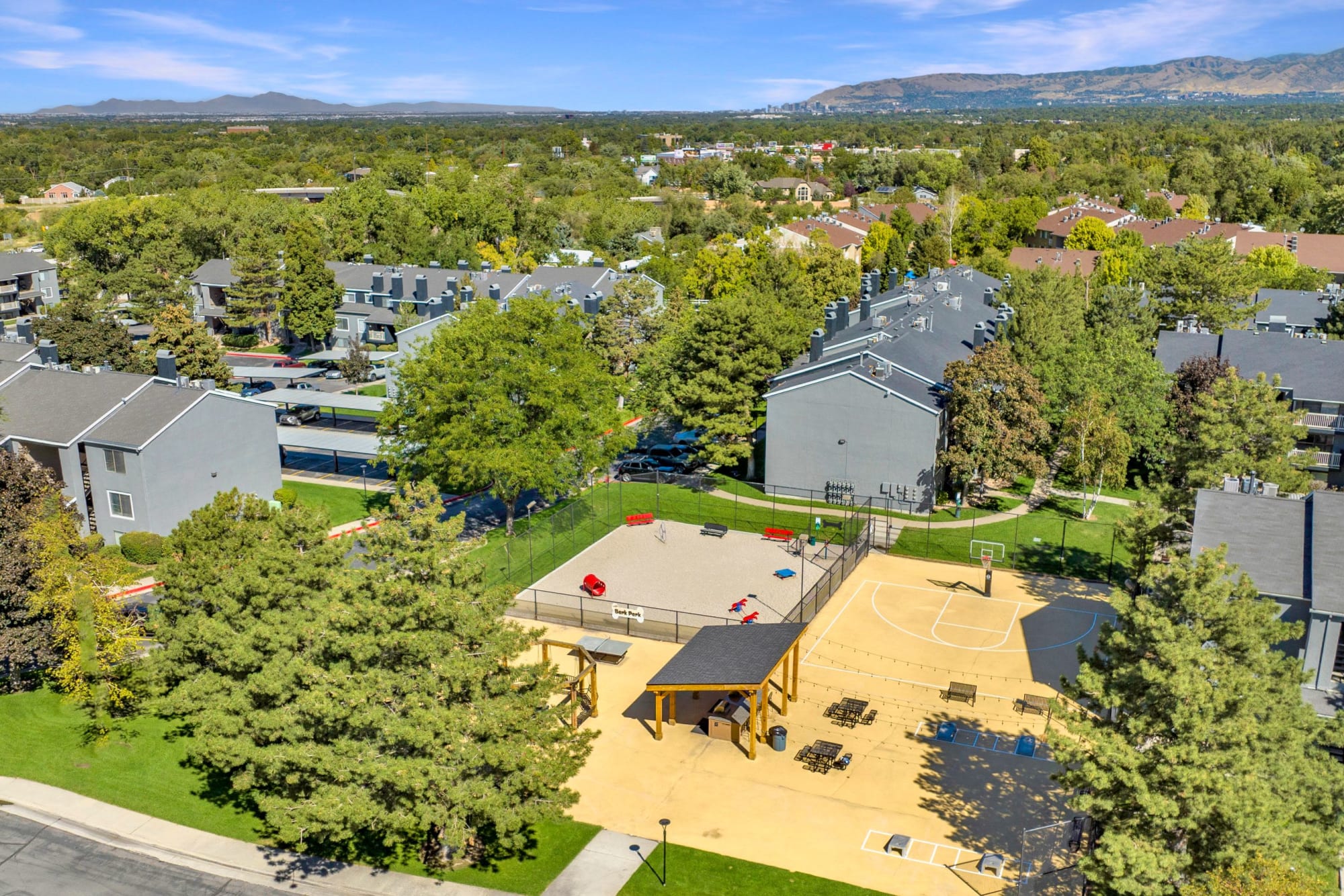 Aerial of Sports Court with Basketball, BBQ, Corn Hole and Fire Pit Swings at Royal Farms Apartments in Salt Lake City, Utah