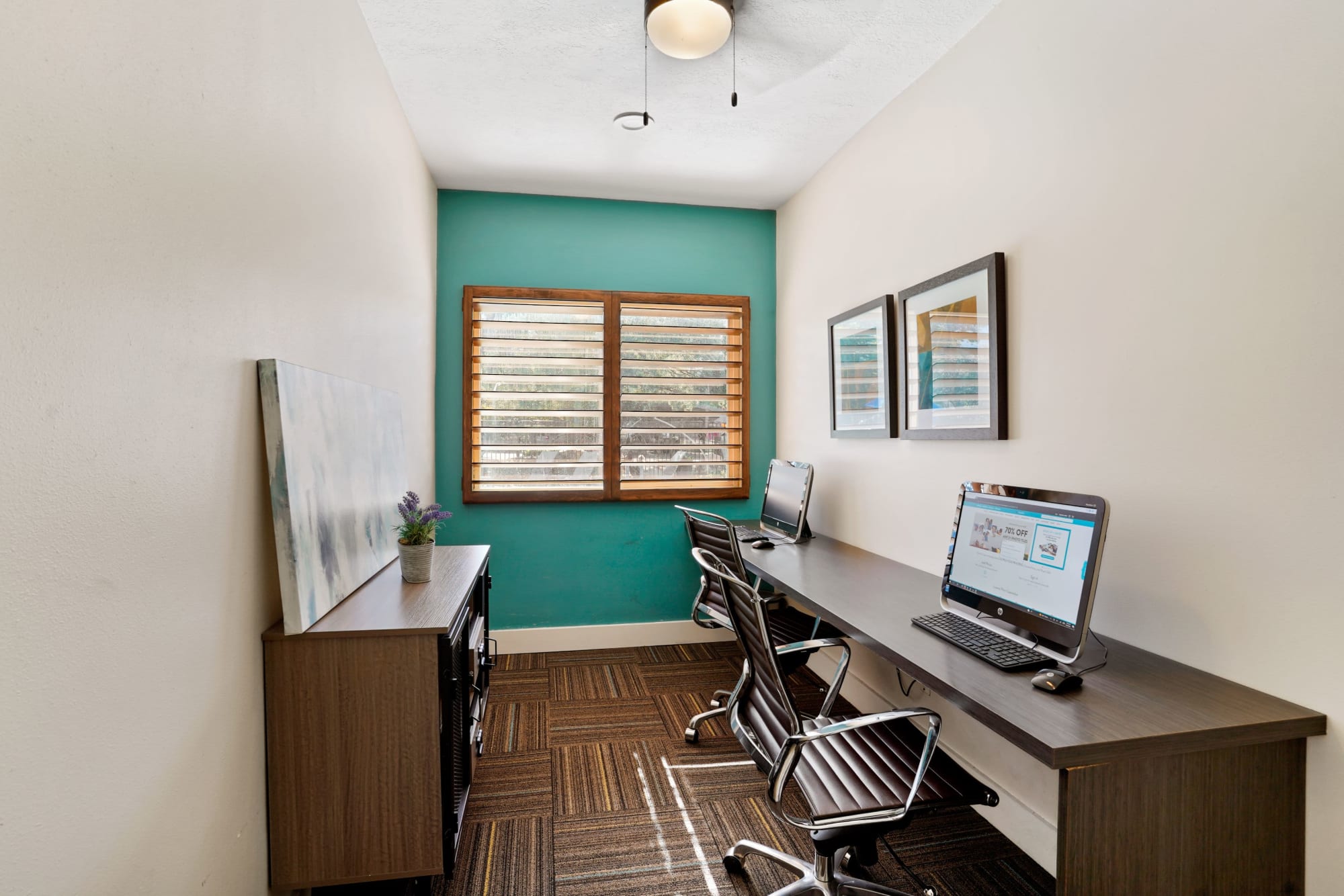 Business center with computers at Royal Ridge Apartments in Midvale, Utah