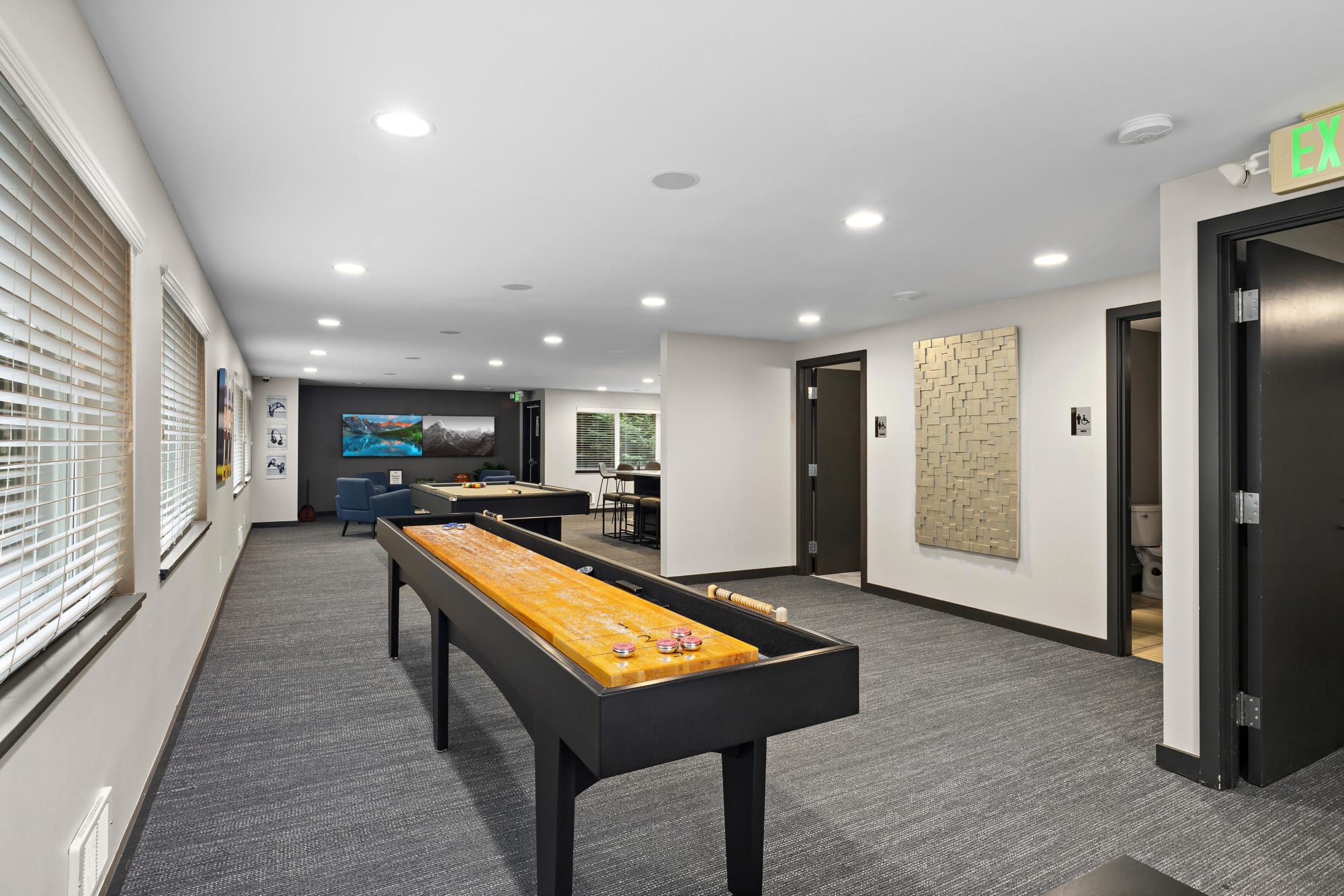 Game Room with Shuffleboard and Pool at Karbon Apartments in Newcastle, Washington