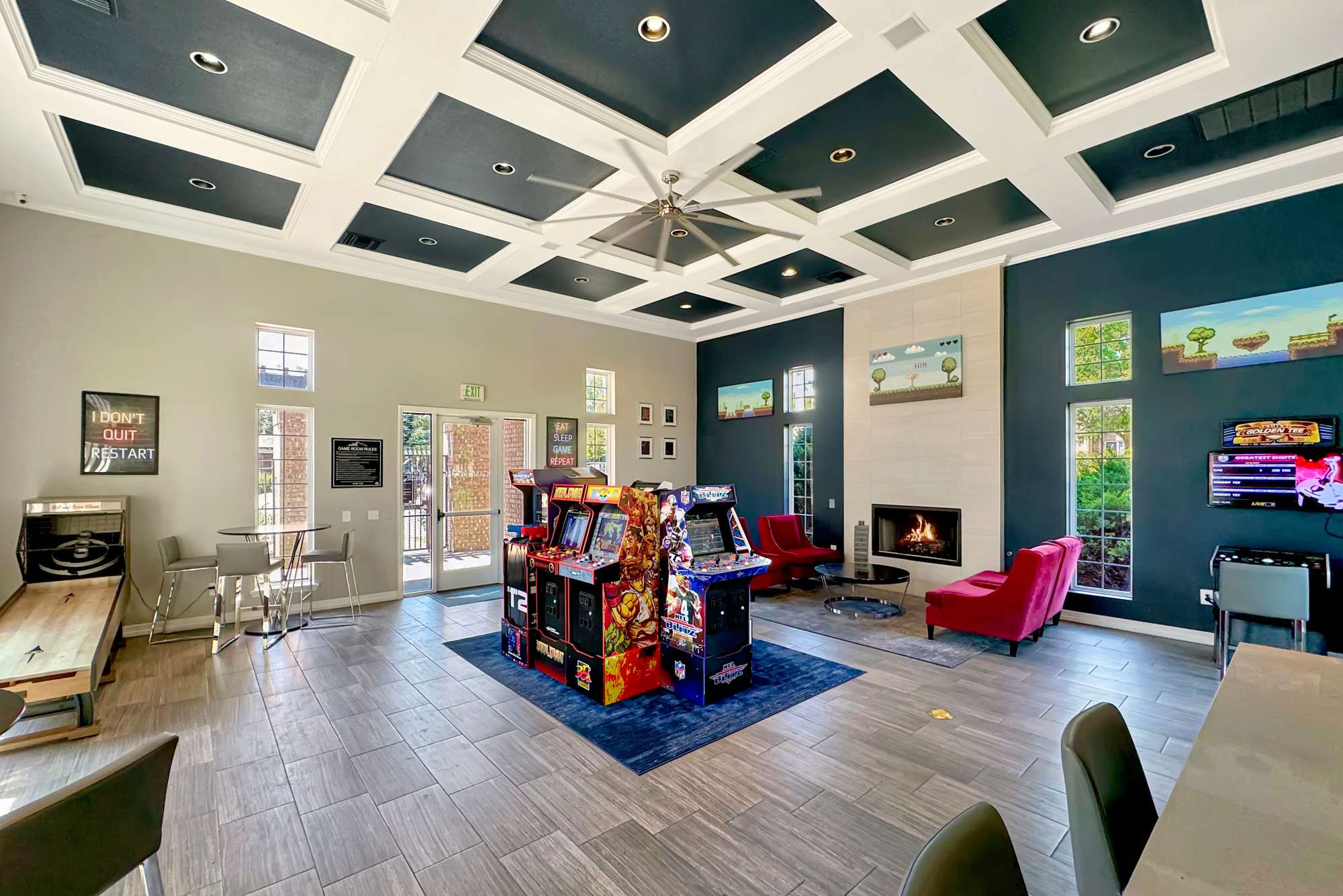 Resident game room and arcade at Hawthorne Hill Apartments in Thornton, Colorado