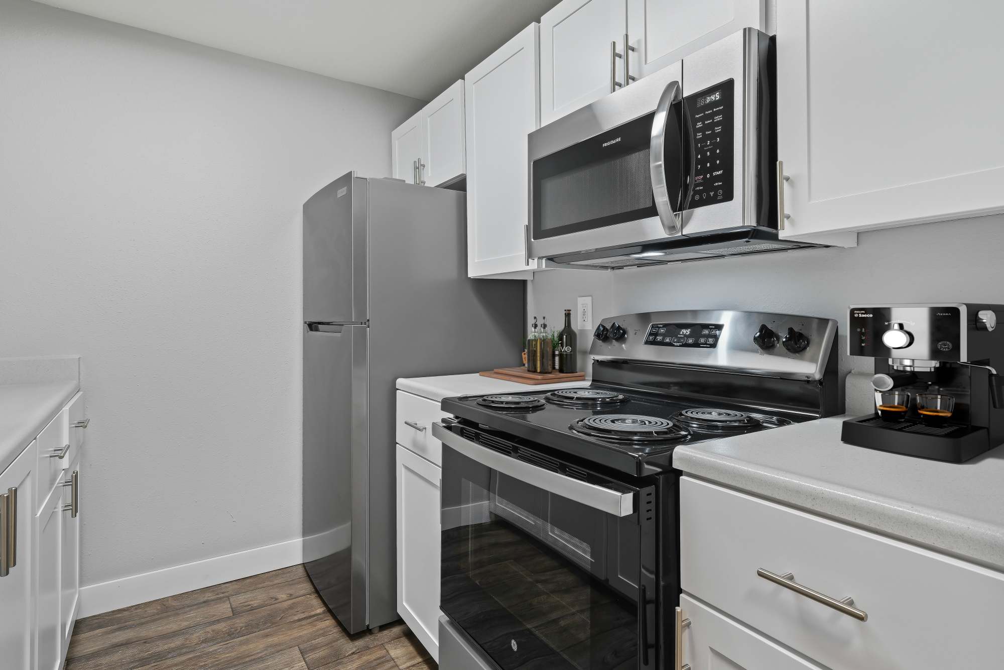 White renovated kitchen at Renaissance at 29th Apartments in Vancouver, Washington