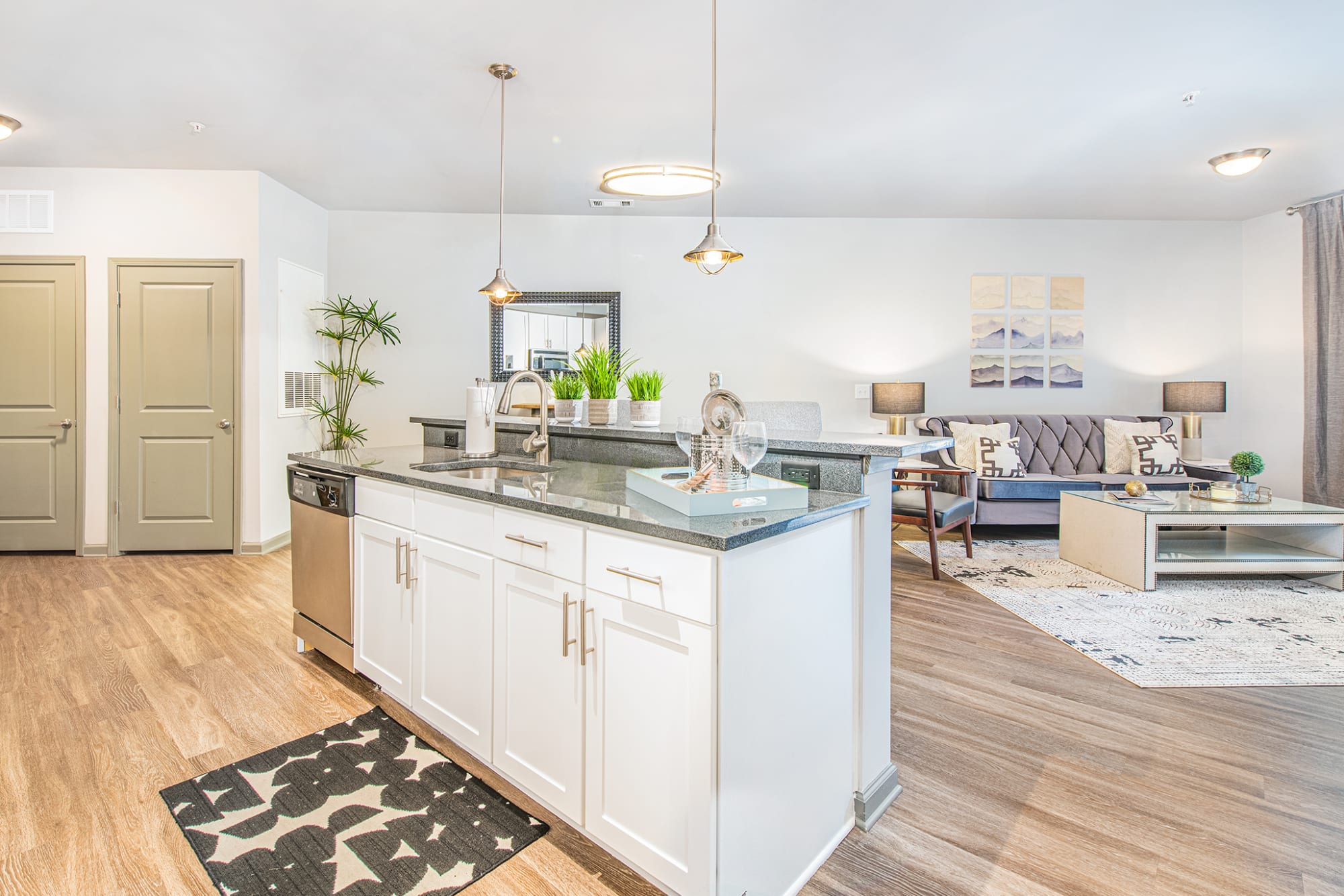 Living room with kitchen island at 400 RHETT in Greenville, South Carolina