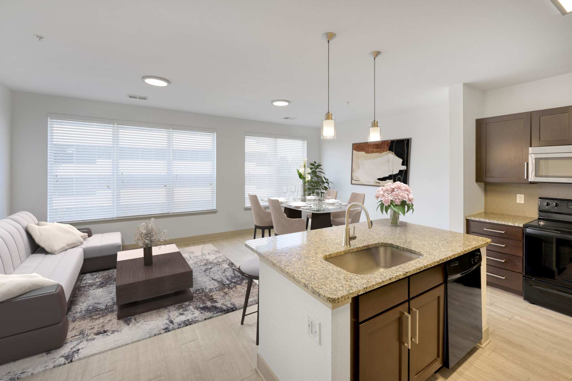 Dining, kitchen, living room view at Helios in Englewood, Colorado