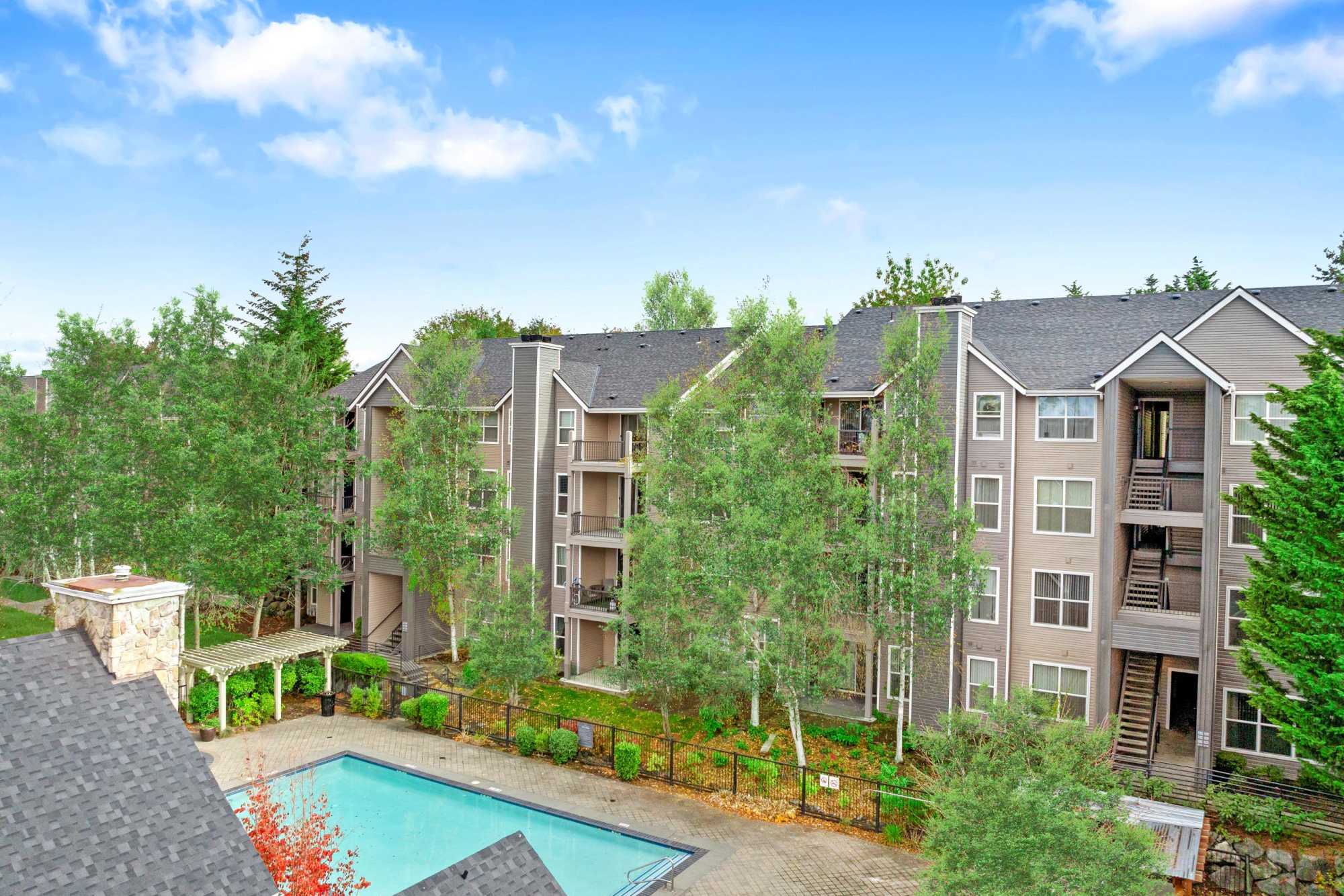 Exterior with lush landscaping at HighGrove Apartments in Everett, Washington