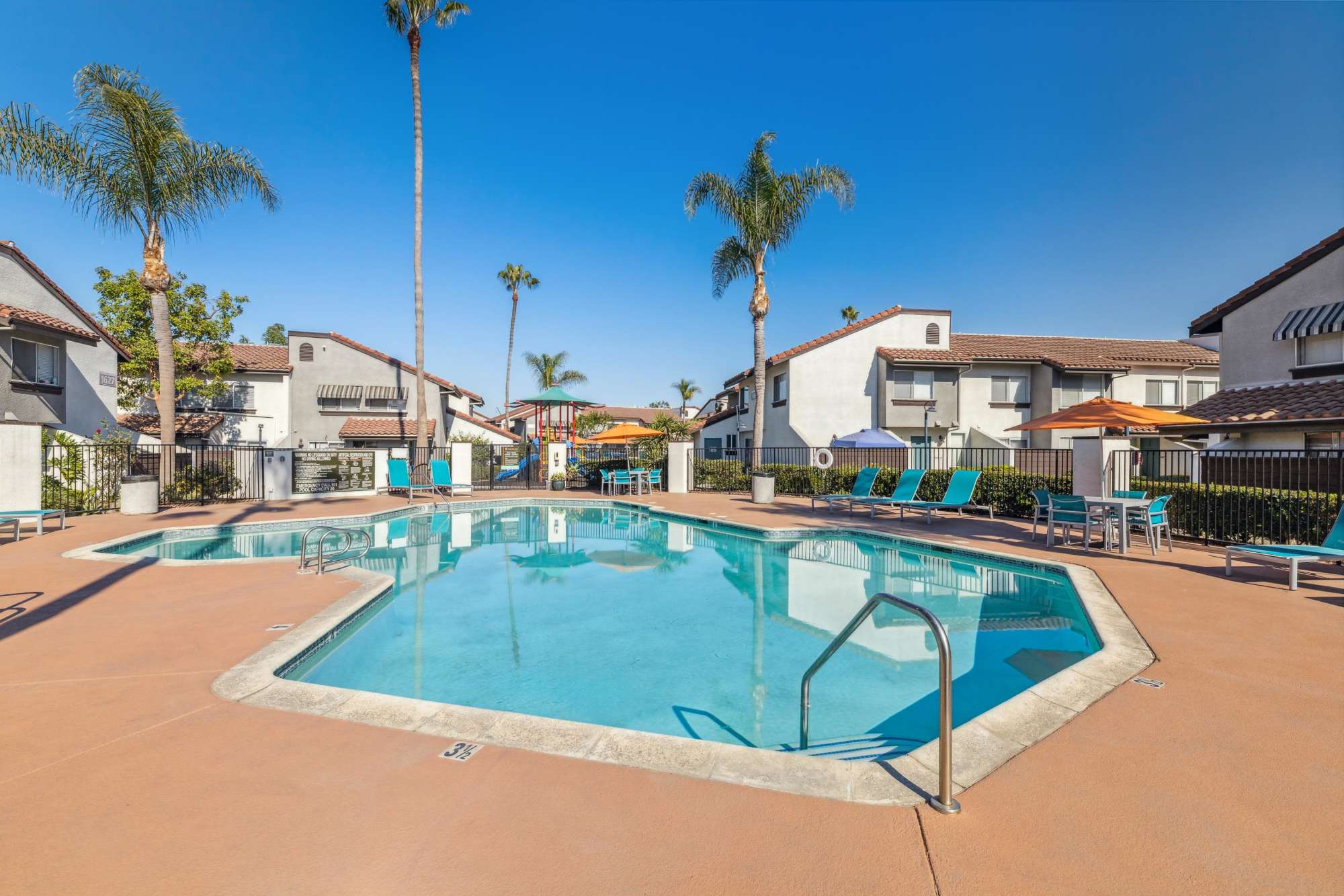 The sparkling swimming pool at Portofino Townhomes in Wilmington, California