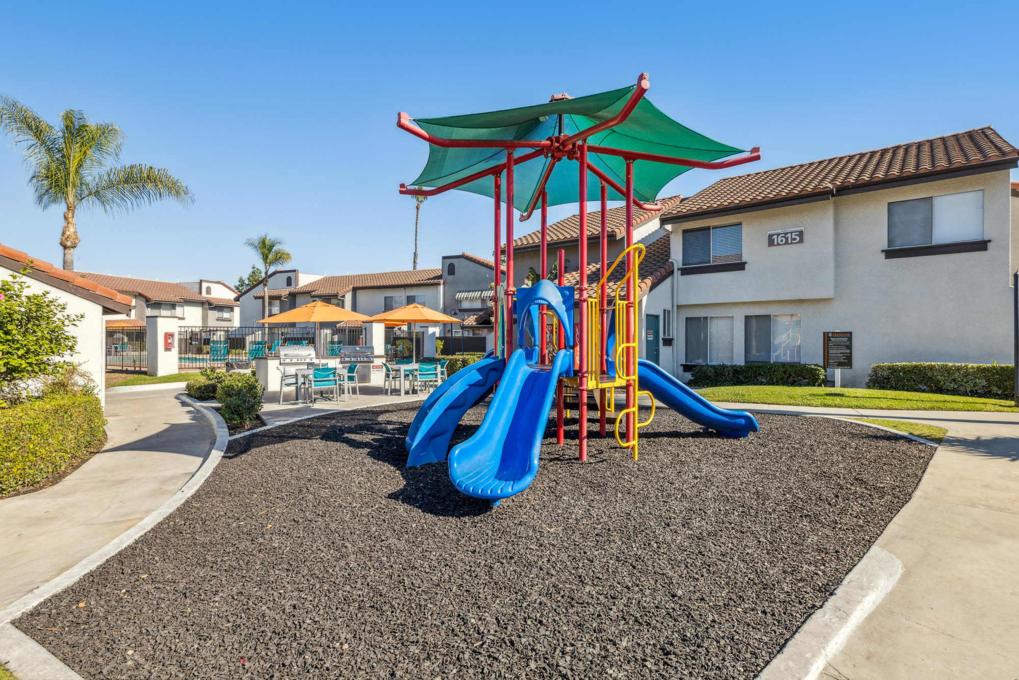 A playground near the pool at Portofino Townhomes in Wilmington, California