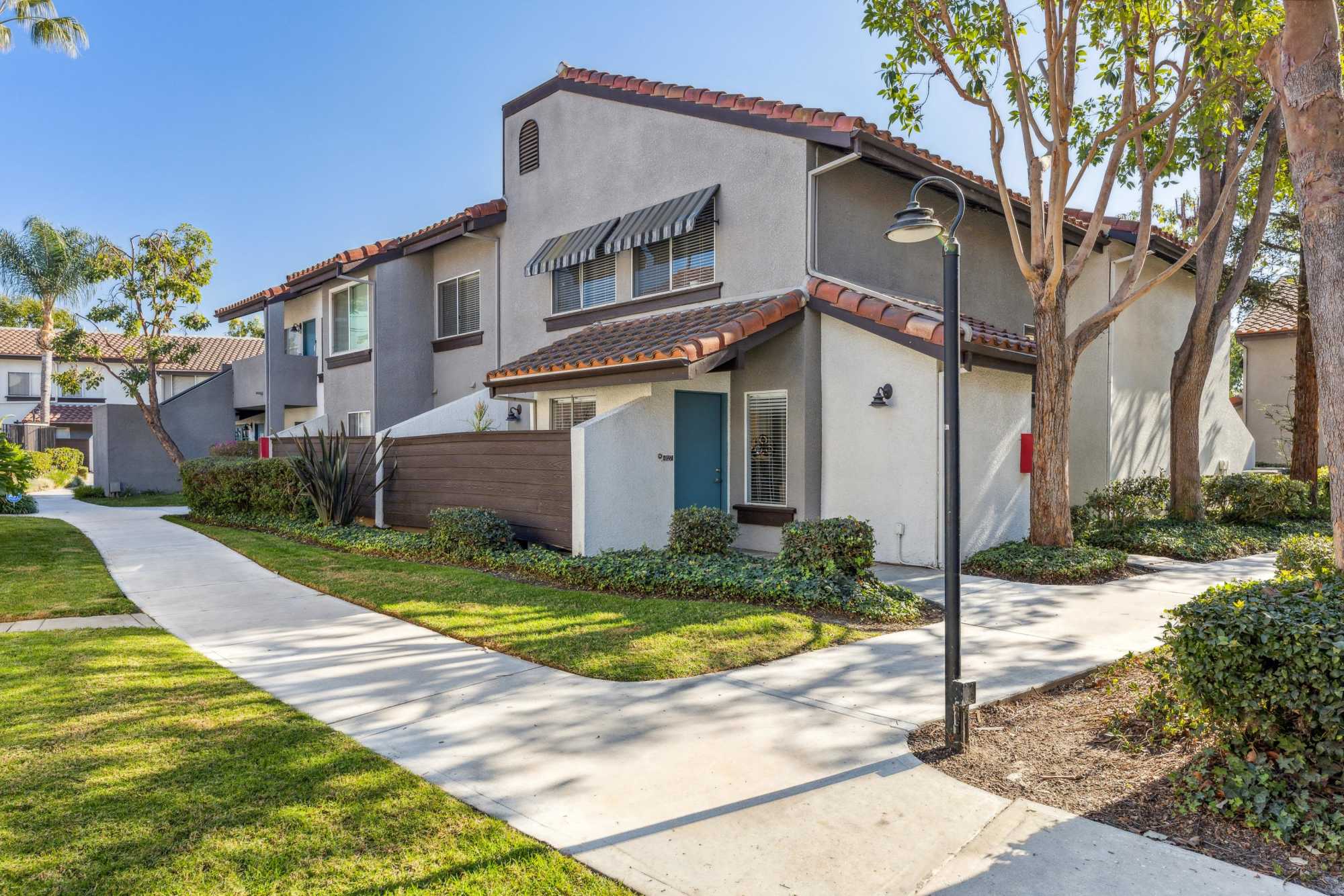 Beautiful landscaping lining the walkways at Portofino Townhomes in Wilmington, California