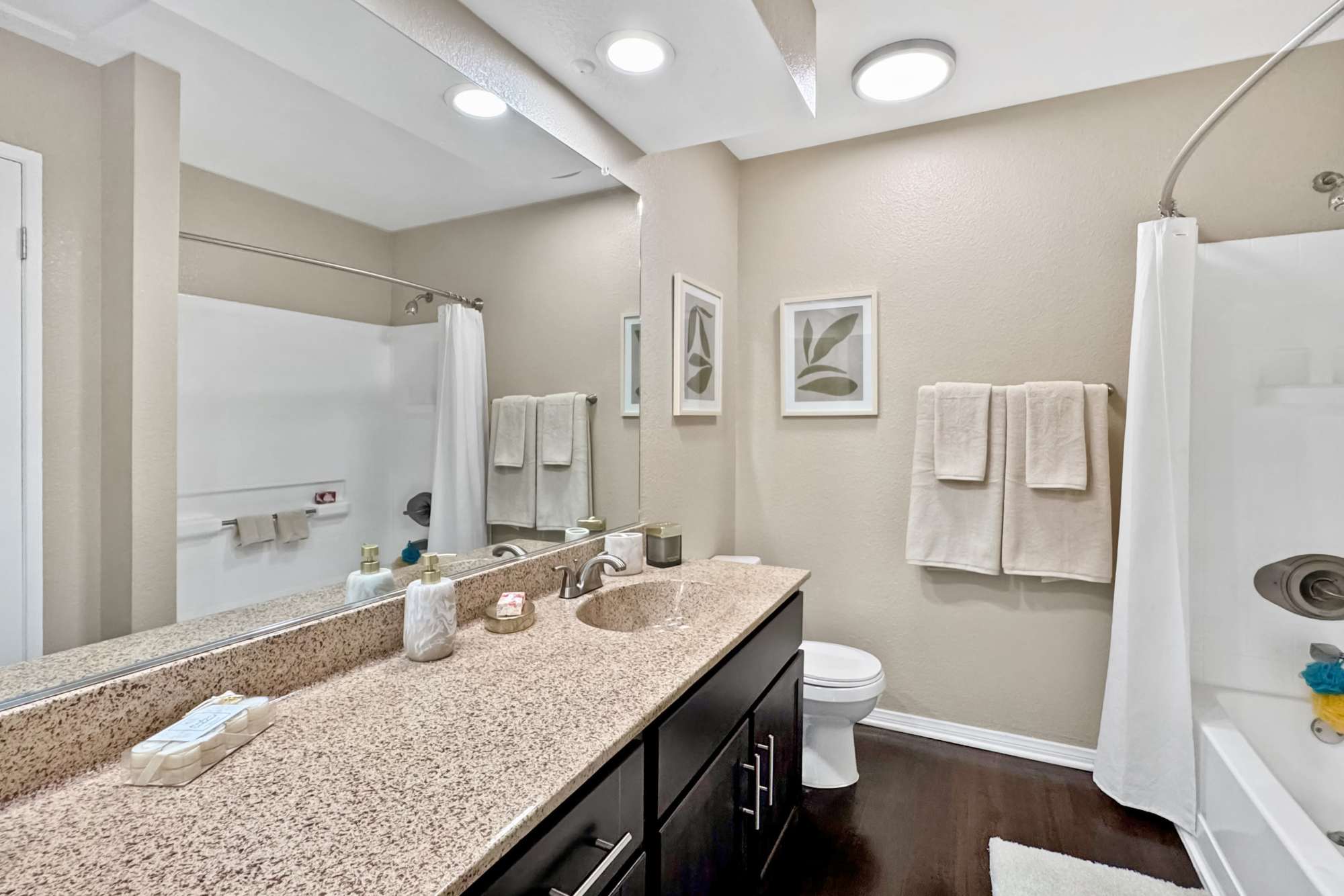 Master bathroom with lots of counter space at Tuscany Village Apartments in Ontario, California