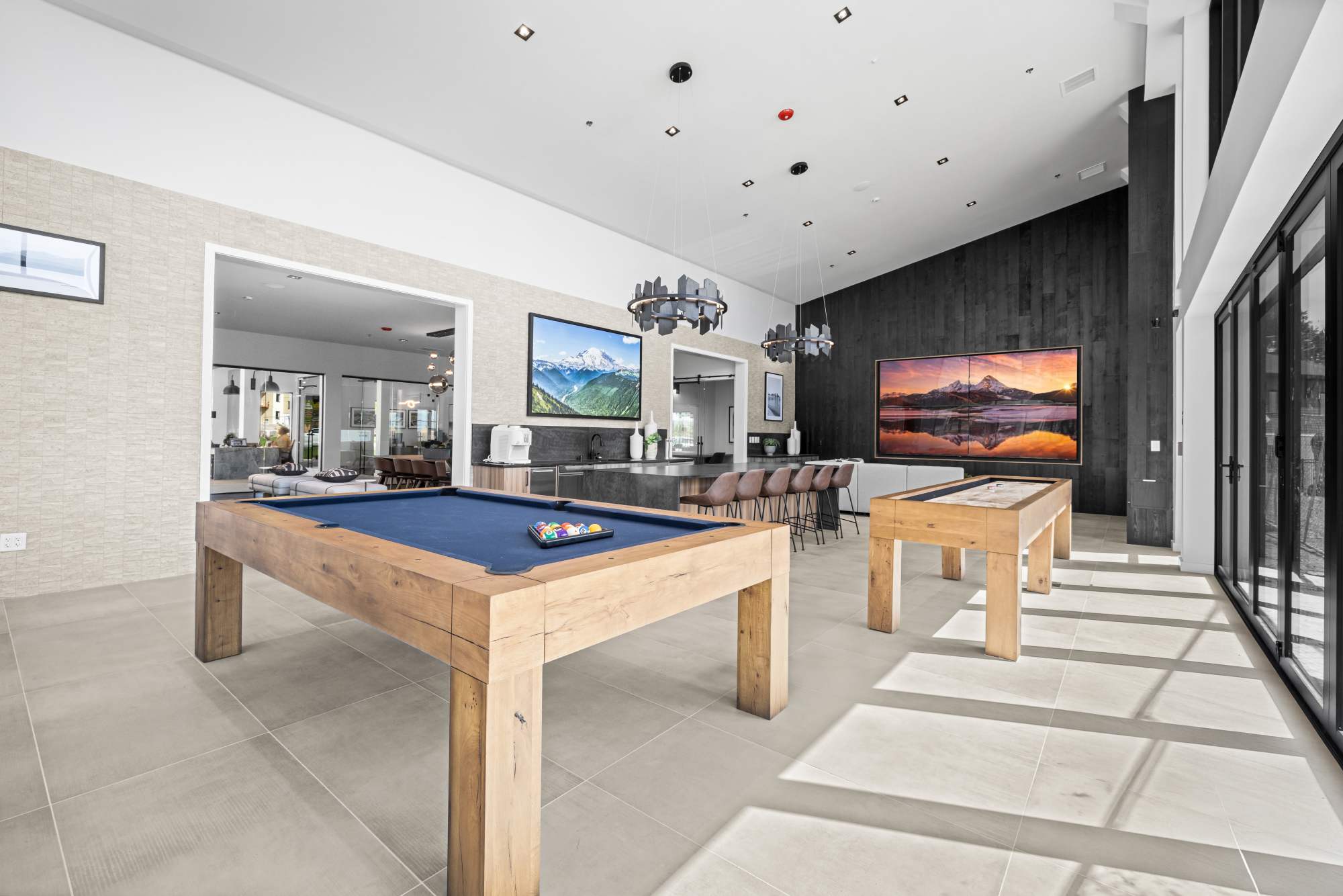 Our clubhouse rec room with pool table, and shuffle board at The Highlands at Silverdale in Silverdale, Washington
