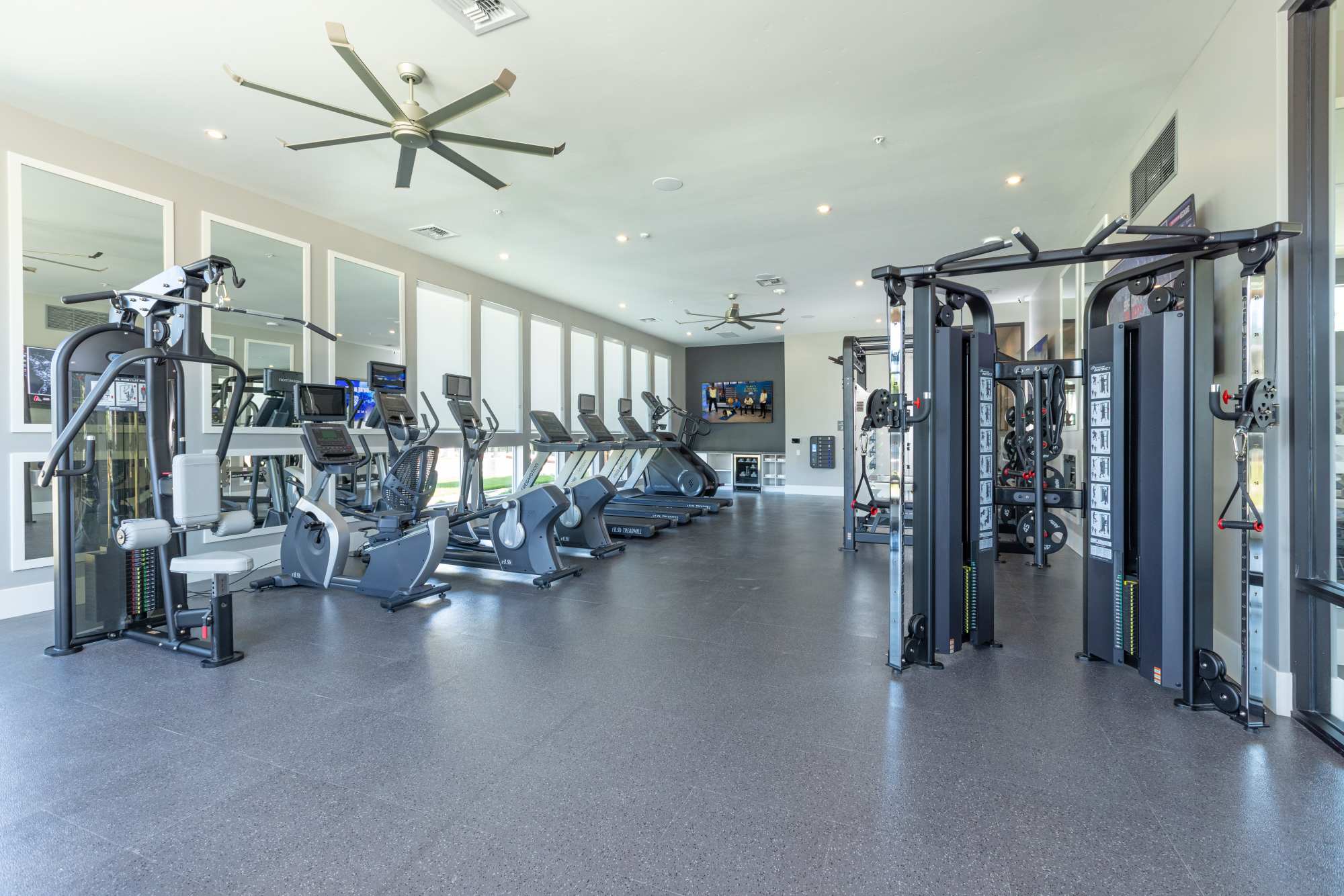 Fitness center with large windows at Solasta in Sacramento, California
