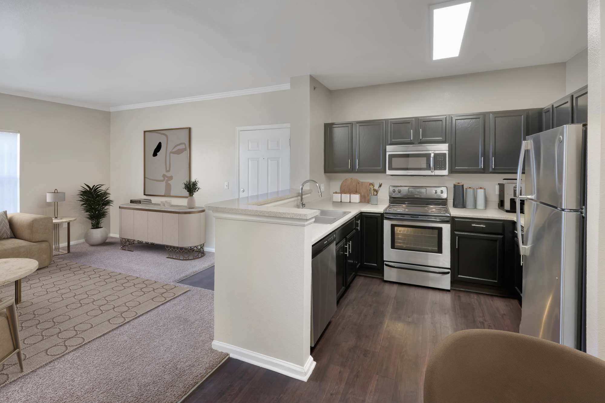 Kitchenwith stainless-steel appliances at Westridge Apartments in Aurora, Colorado