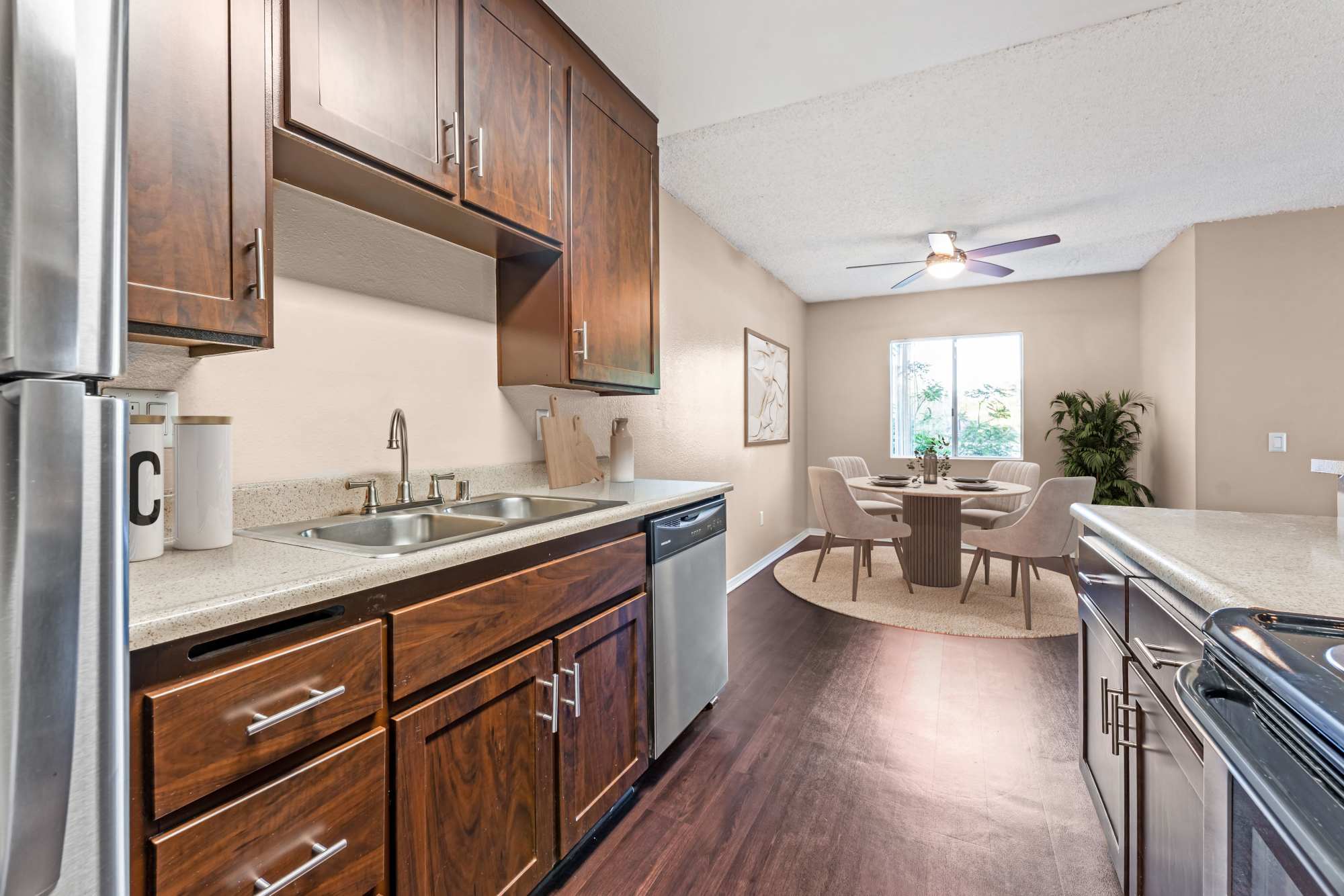 Newly renovated kitchen with stainless steel appliances at Shadow Ridge Apartments in Oceanside, California