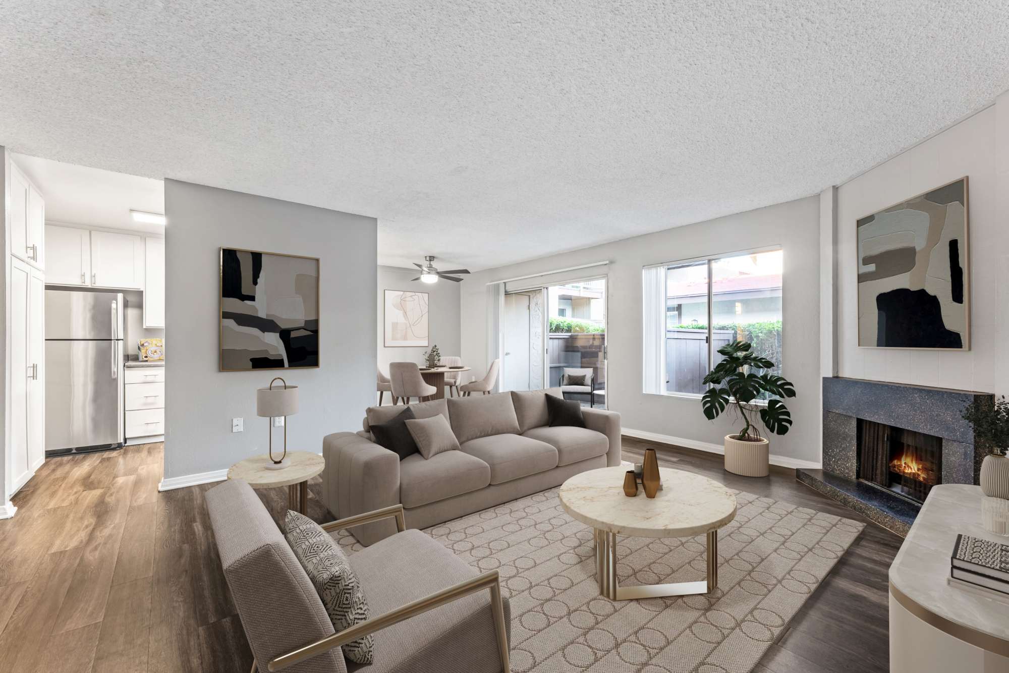 Spacious living room with a fireplace at Shadow Ridge Apartments in Oceanside, California