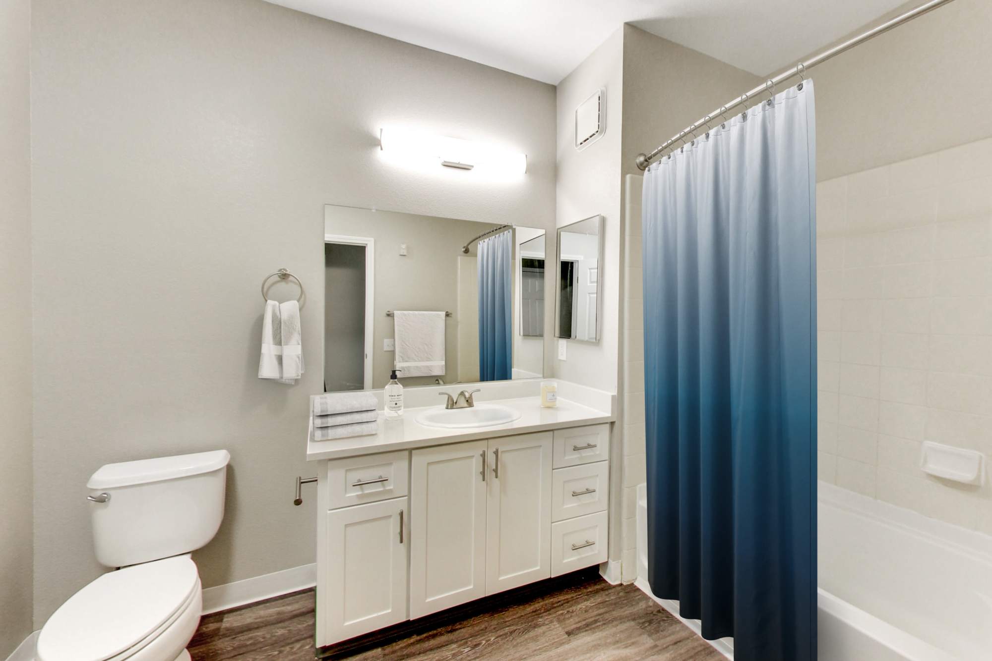Bathroom with bathtub at Avion Apartments in Rancho Cordova, California