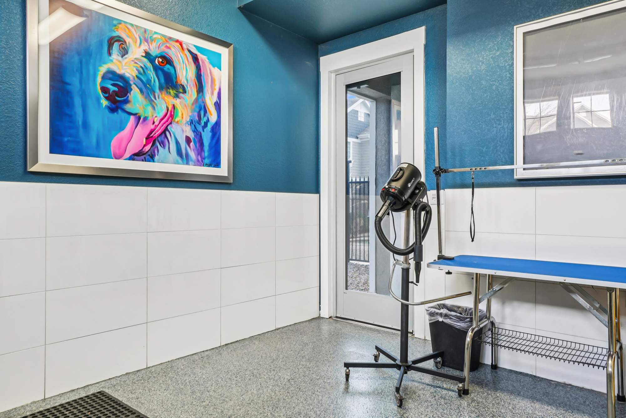 The dog washing room with dryer at Crestone Apartments in Aurora, Colorado