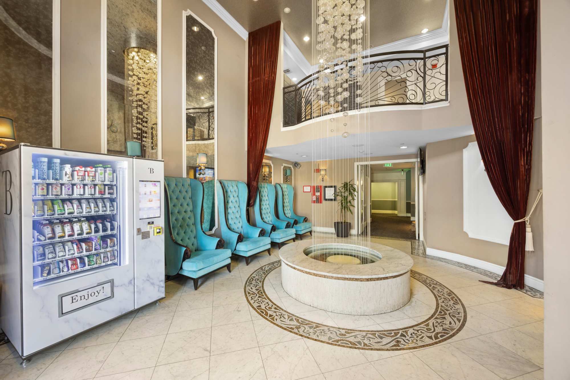 Entry to Leasing Office with Fountain and Cantaloupe Vending Machine at La Belle at Hollywood Tower in Los Angeles, California
