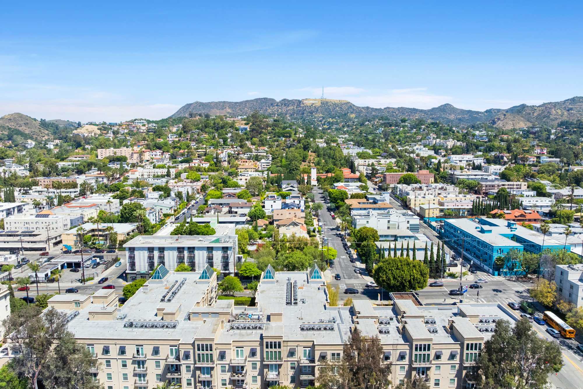 Aerial View of Building Looking back towards Hollywood Sign at La Belle at Hollywood Tower in Los Angeles, California