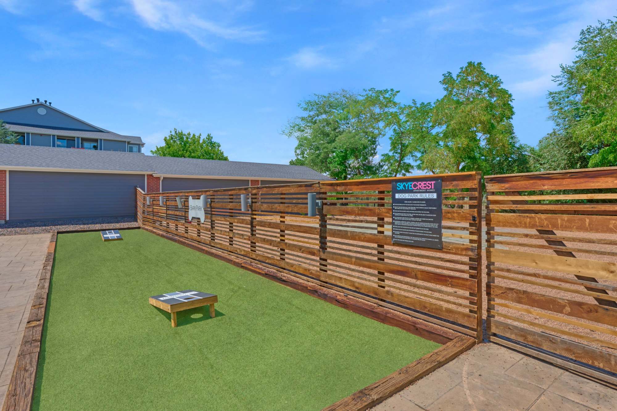 Corn Hole and Dog Park Area at Skyecrest Apartments in Lakewood, Colorado