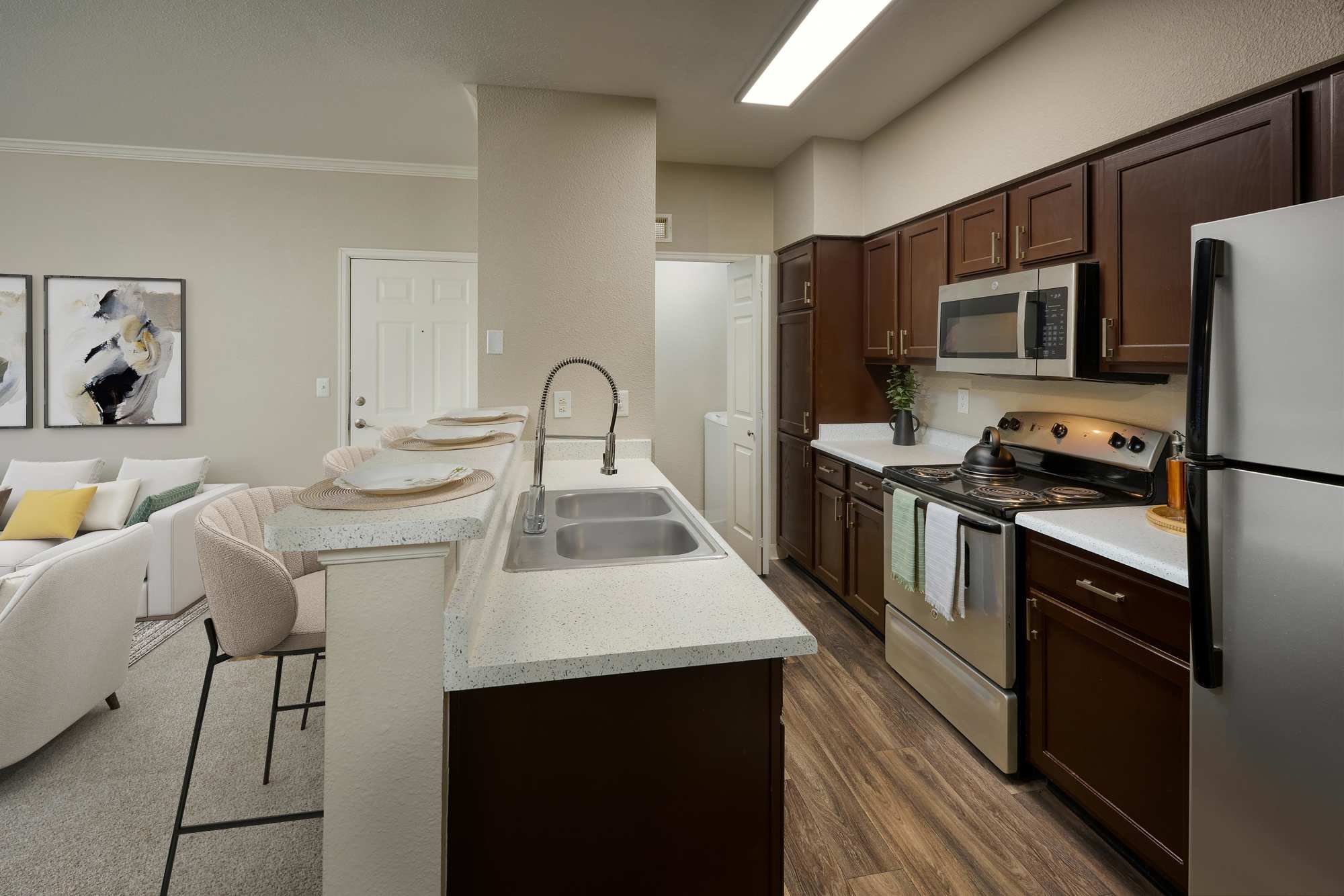 Renovated Brown Kitchen at Skyecrest Apartments in Lakewood, Colorado