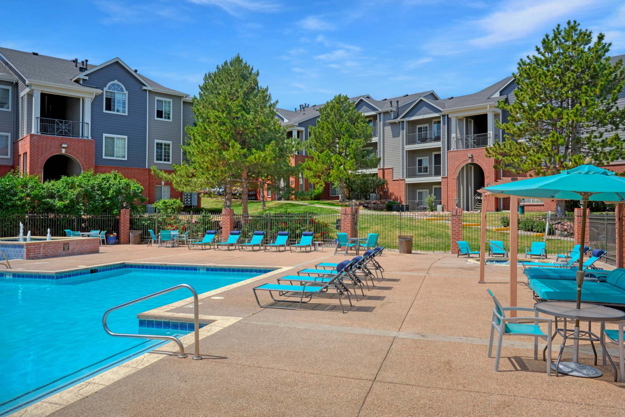 Swimming pool area at Skyecrest Apartments in Lakewood, Colorado