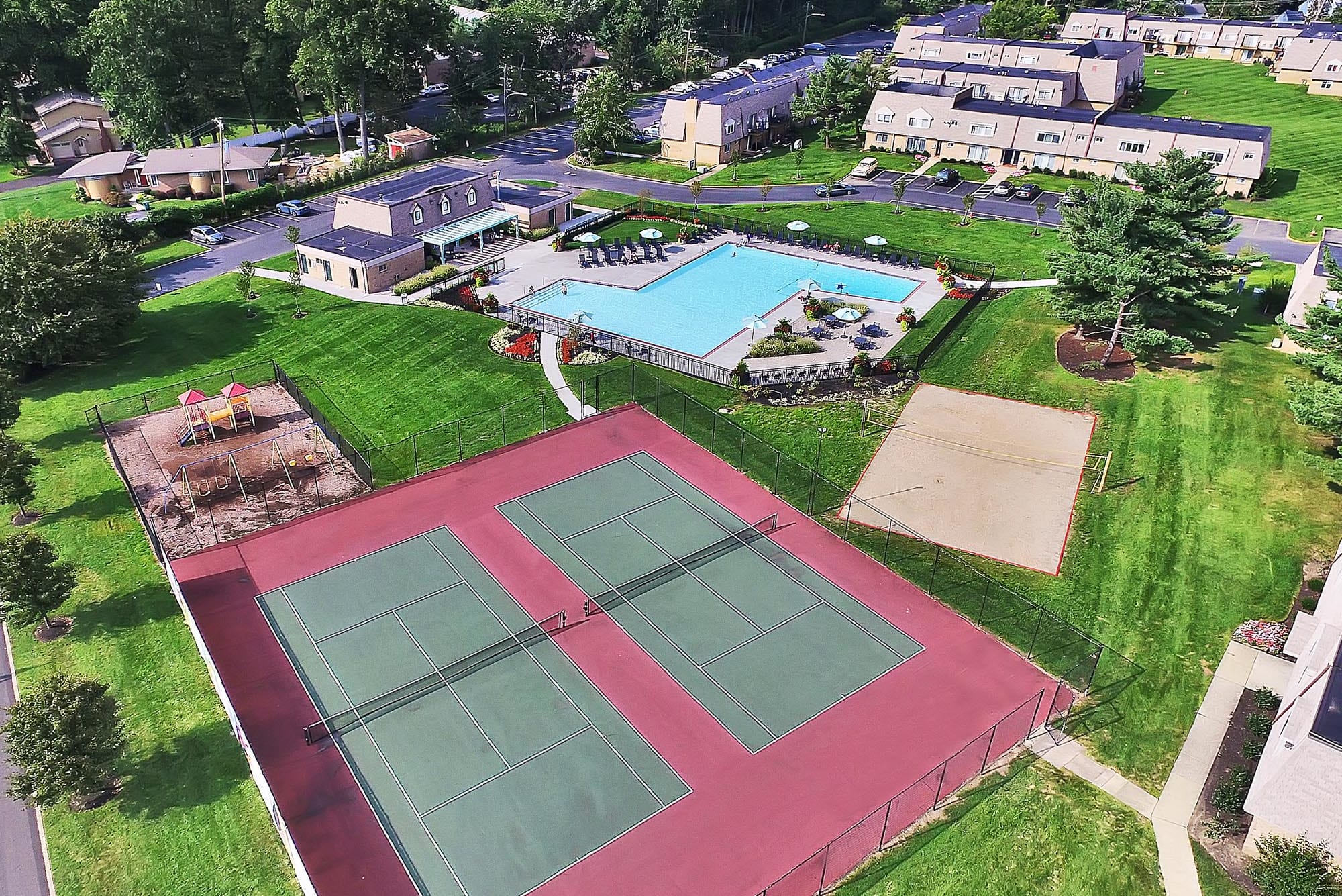 Aerial view of tennis courts, volleyball and pool at The Commons, Bensalem, Pennsylvania