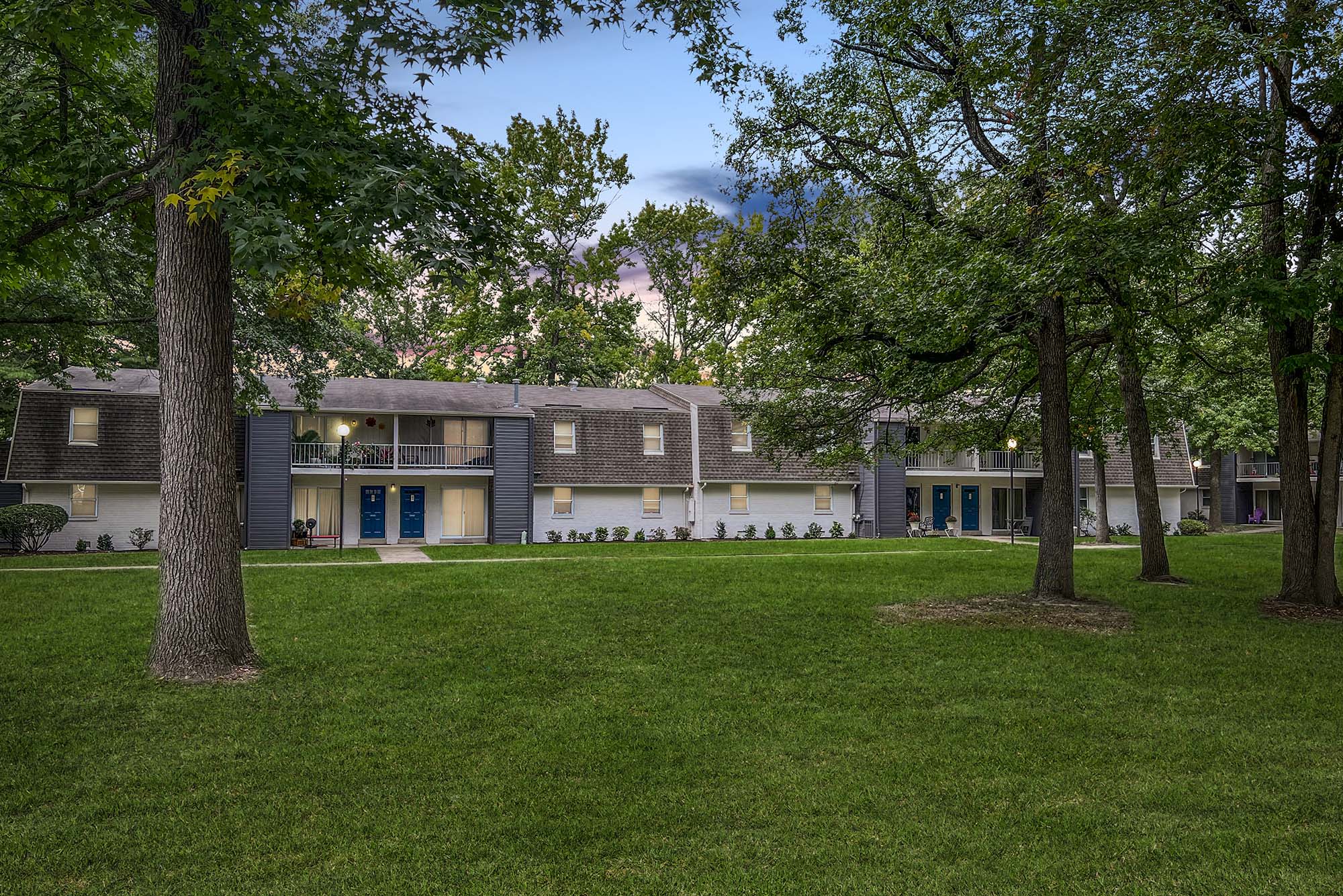 exterior view of trees and landscape at dusk at The Nolan, Morrisville, Pennsylvania