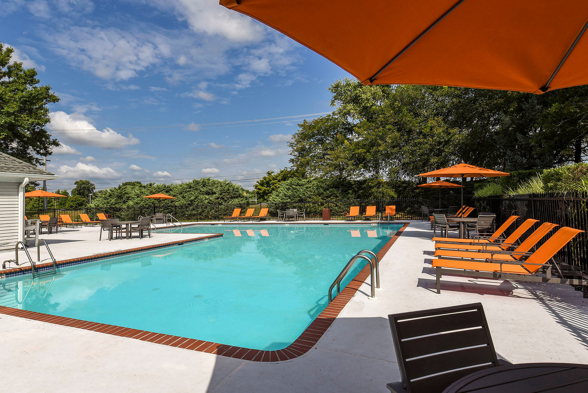 Pool and sundeck at Iron Ridge and Stonegate Apartments in Elkton, Maryland