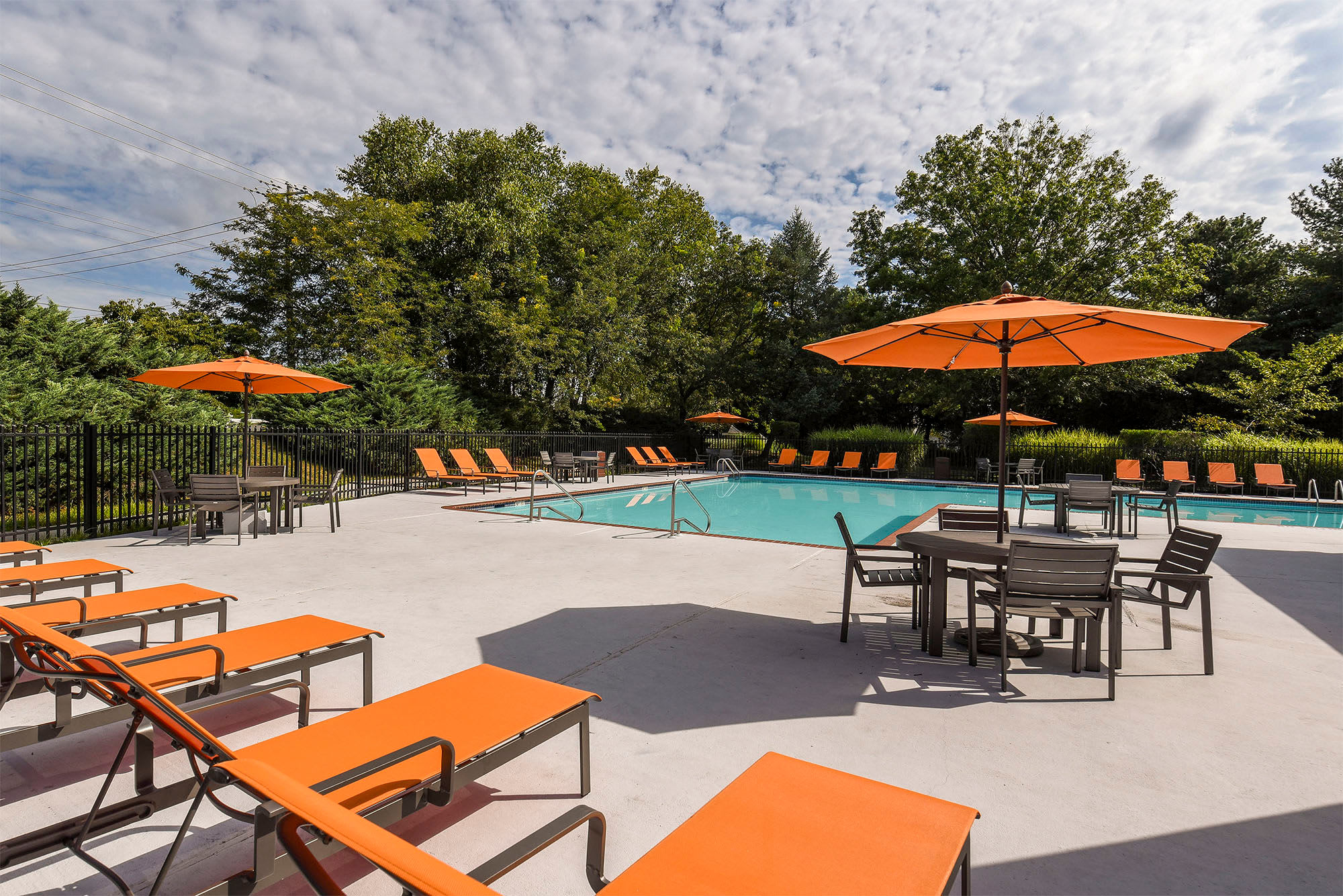 Pool and sundeck at Iron Ridge and Stonegate Apartments in Elkton, Maryland