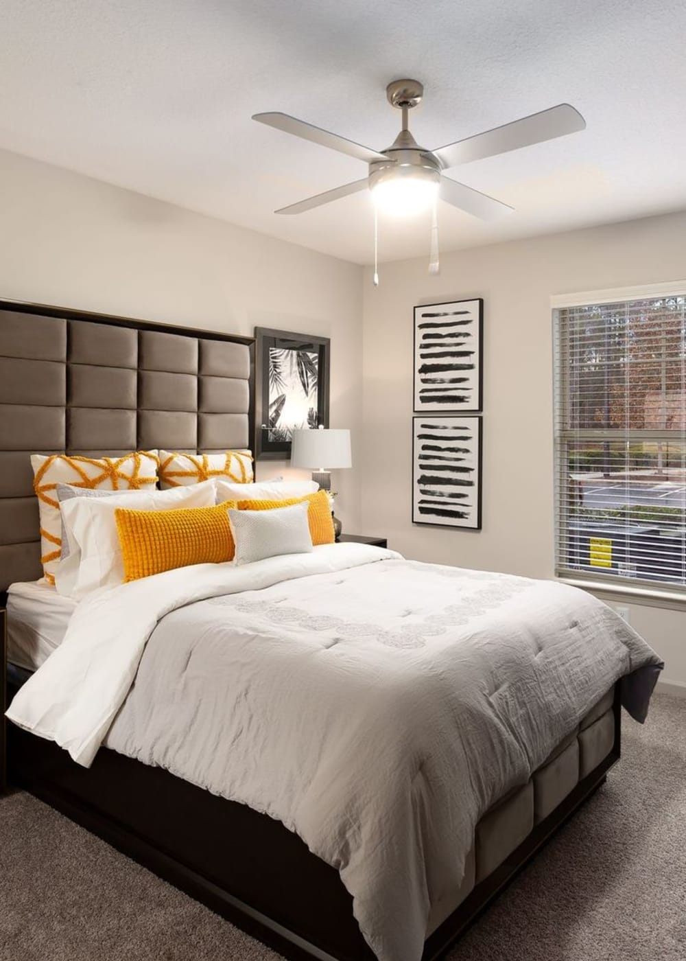Bedroom with ceiling fan at Landing Square in Atlanta, Georgia