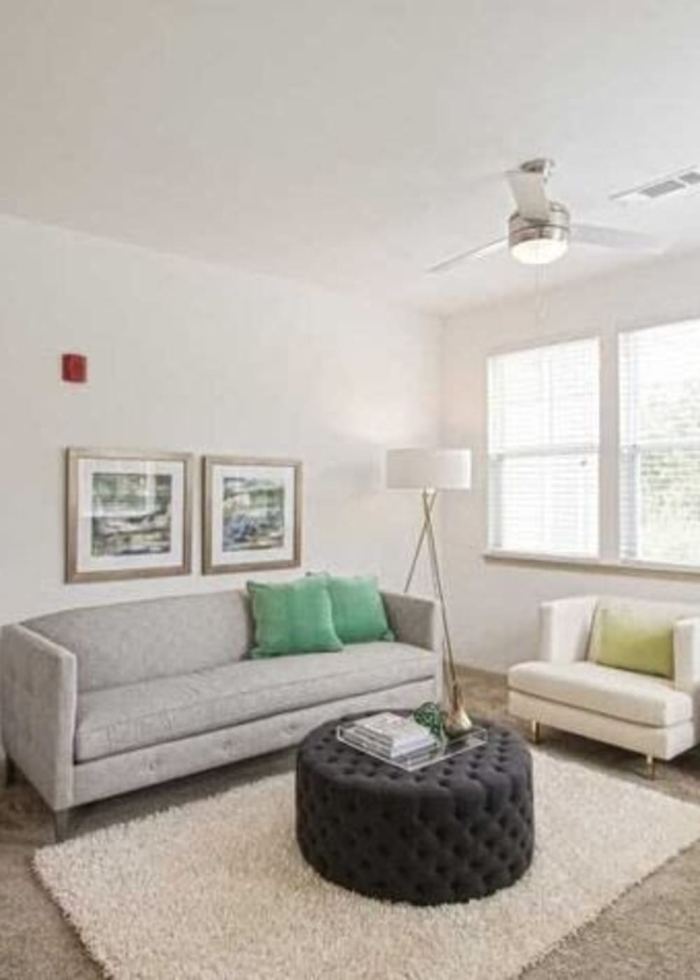 A furnished apartment living room at Village at Rice Hope in Port Wentworth, Georgia