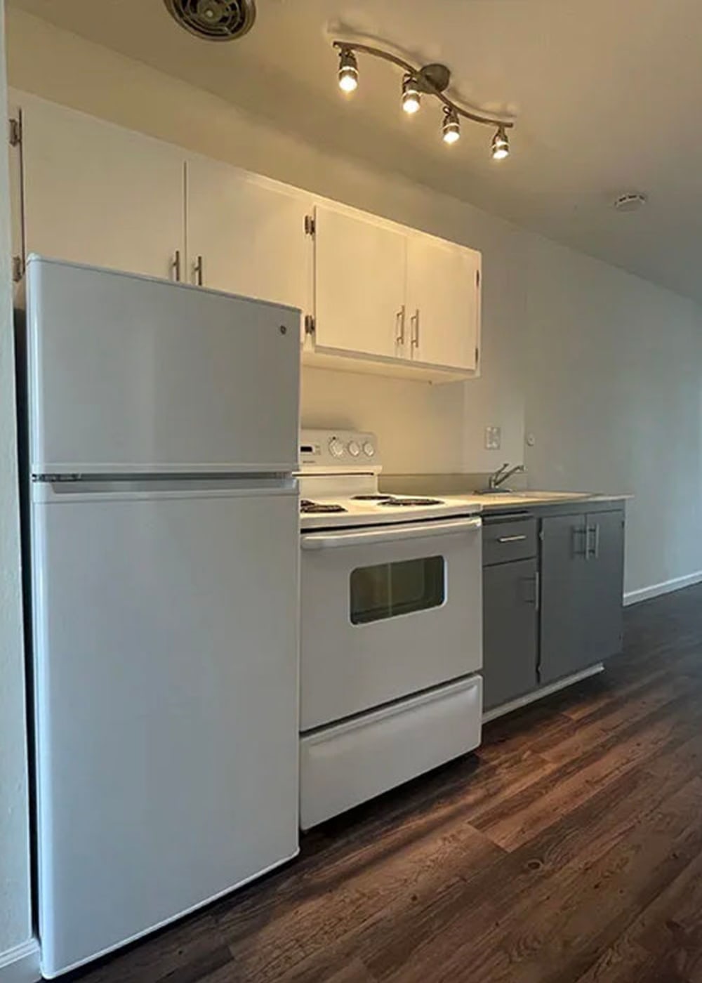 Kitchen with white appliances at 225 Clifton in Oakland, California