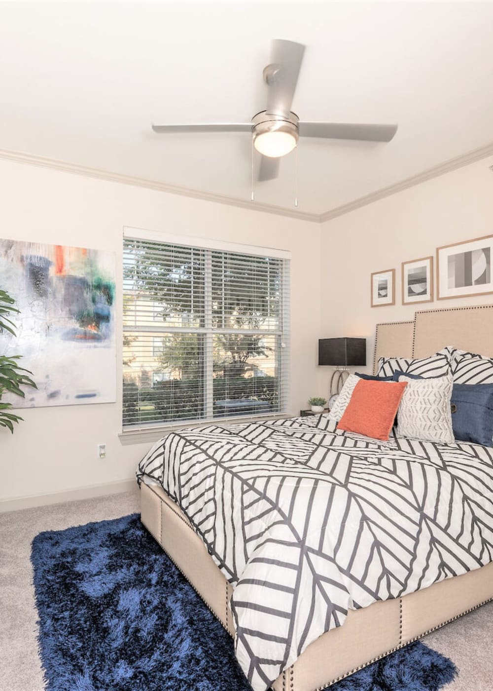 Bedroom at Woodbridge Villas Apartments in Sachse, Texas