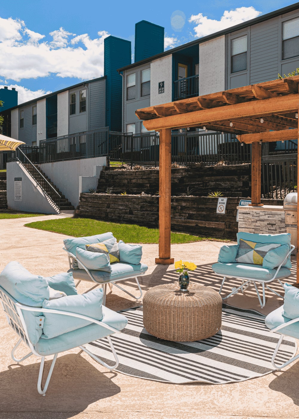 Modern poolside lounge at Creekside Apartment Homes in Fort Worth, Texas