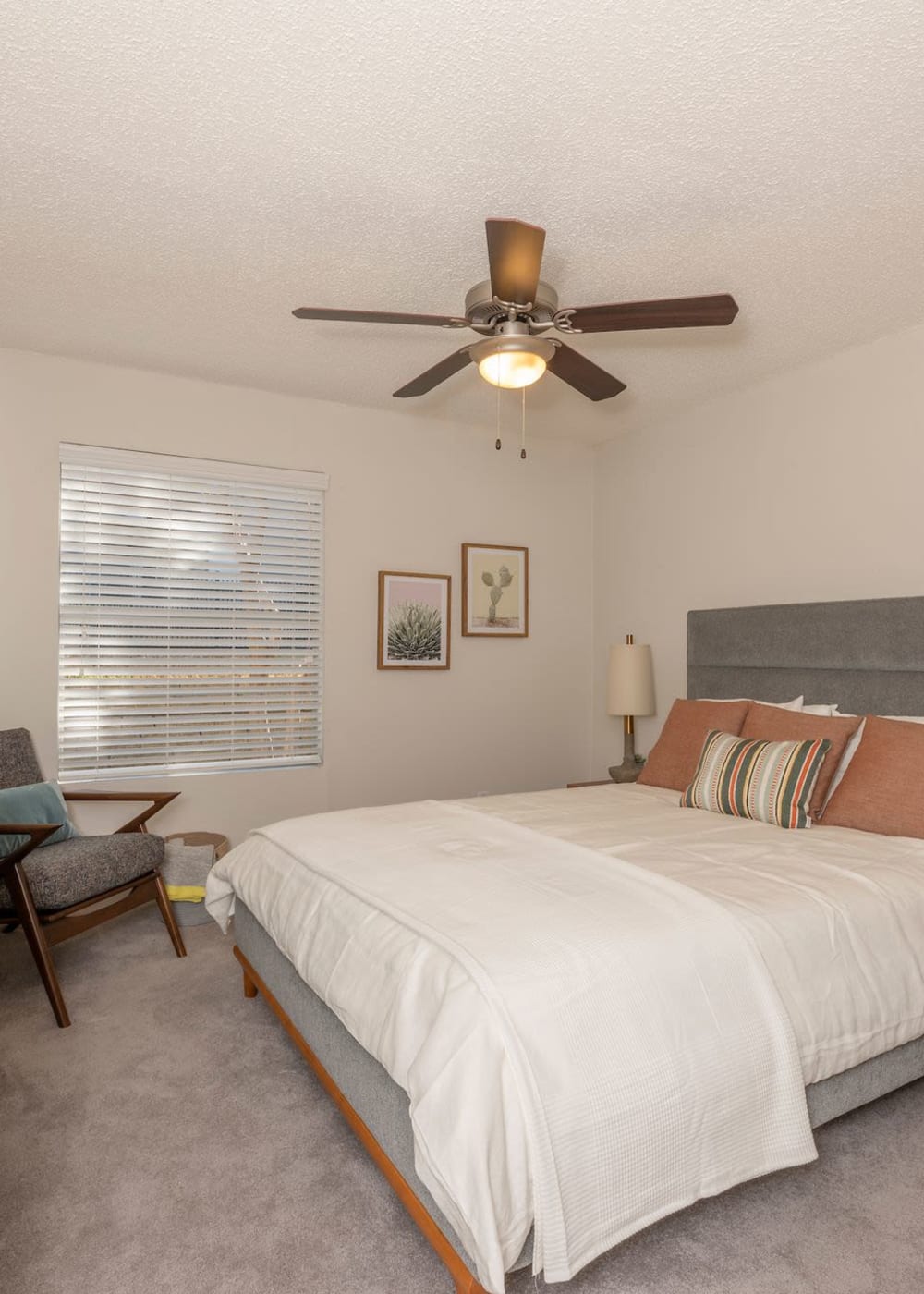 Bedroom with ceiling fan at Grace Woods in Austin, Texas