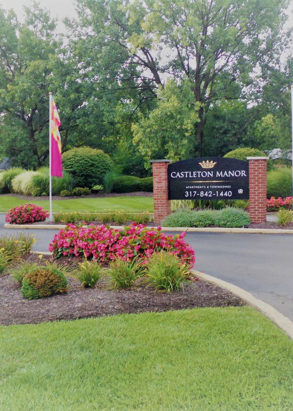 Exterior sign at Castleton Manor Apartments in Indianapolis, Indiana