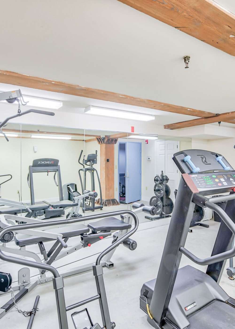 Exercise equipment in the fitness center at Cigar Lofts in Richmond, Virginia