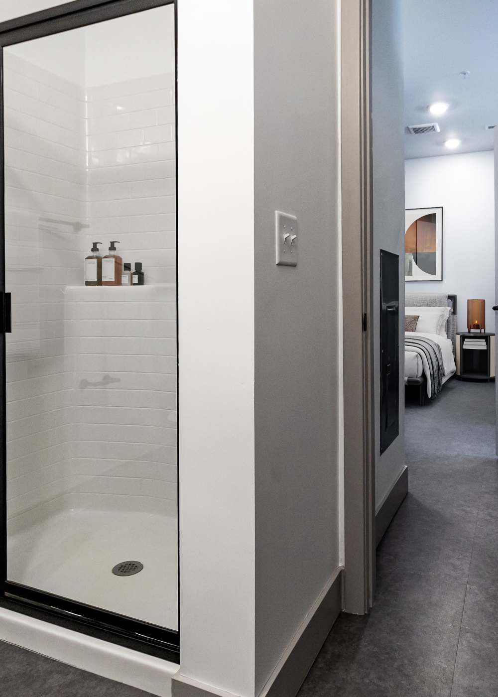 Bathroom and hallway in a model home at Sphere Apartments in Richmond, Virginia