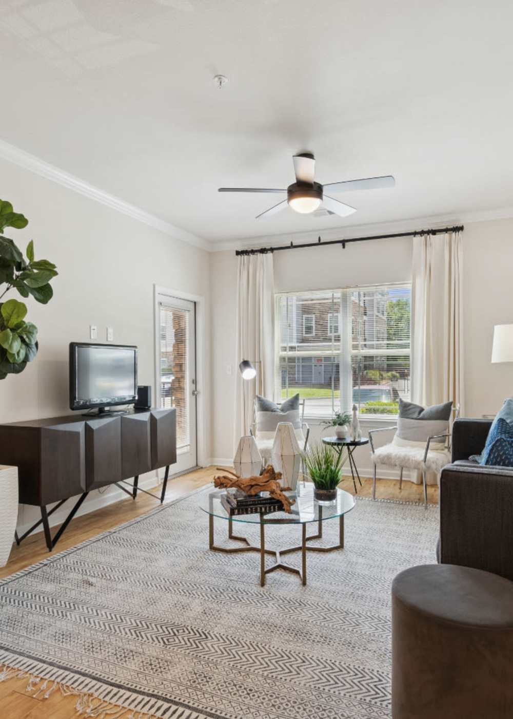 A dining room table in a model apartment at Evergreen at Five Points in Valdosta, Georgia